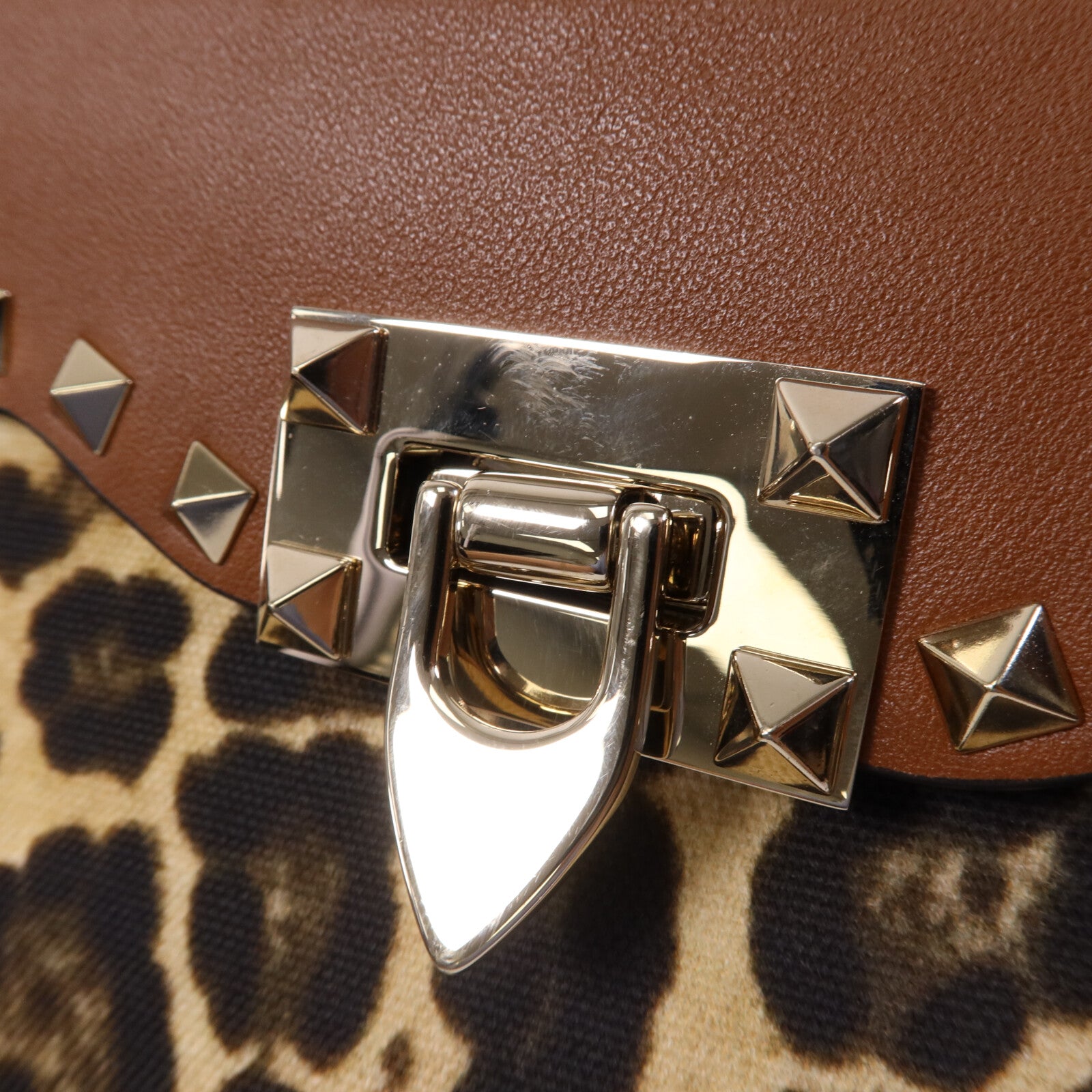 Valentino 牛皮皮革/帆布Garavani Rockstud金扣肩背袋
