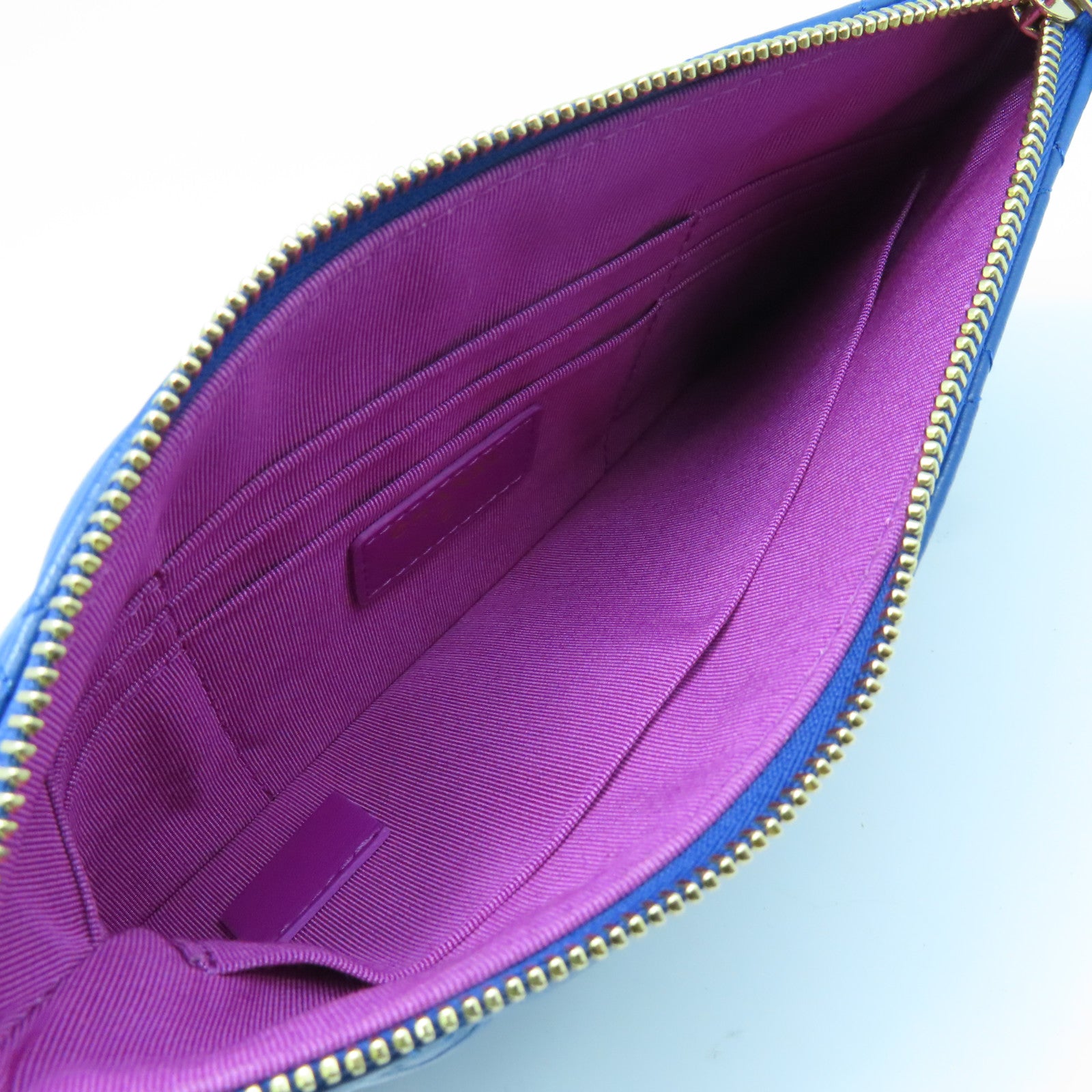 CHANEL diamond leather Pouch gold buckle clutch blue