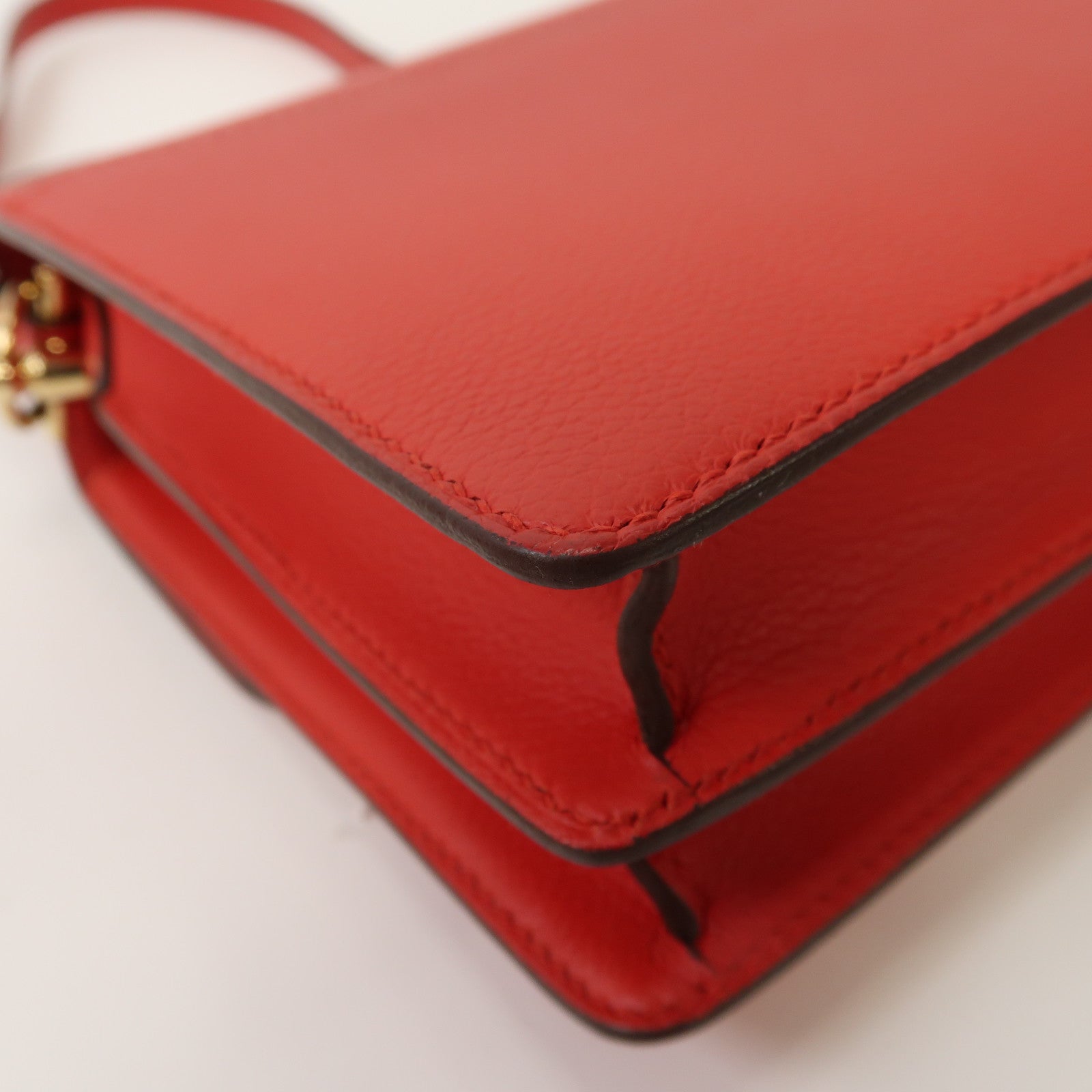 HERMES Evercolor皮革Mini Roulis金扣肩背袋Rouge Casaque法拉利紅