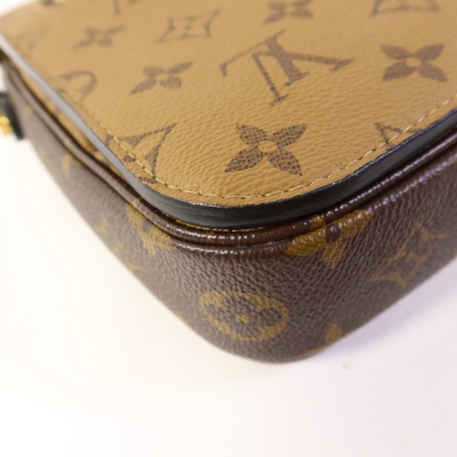 LOUIS VUITTON Monogram Reverse Pochette Metis金扣手挽肩背兩用袋