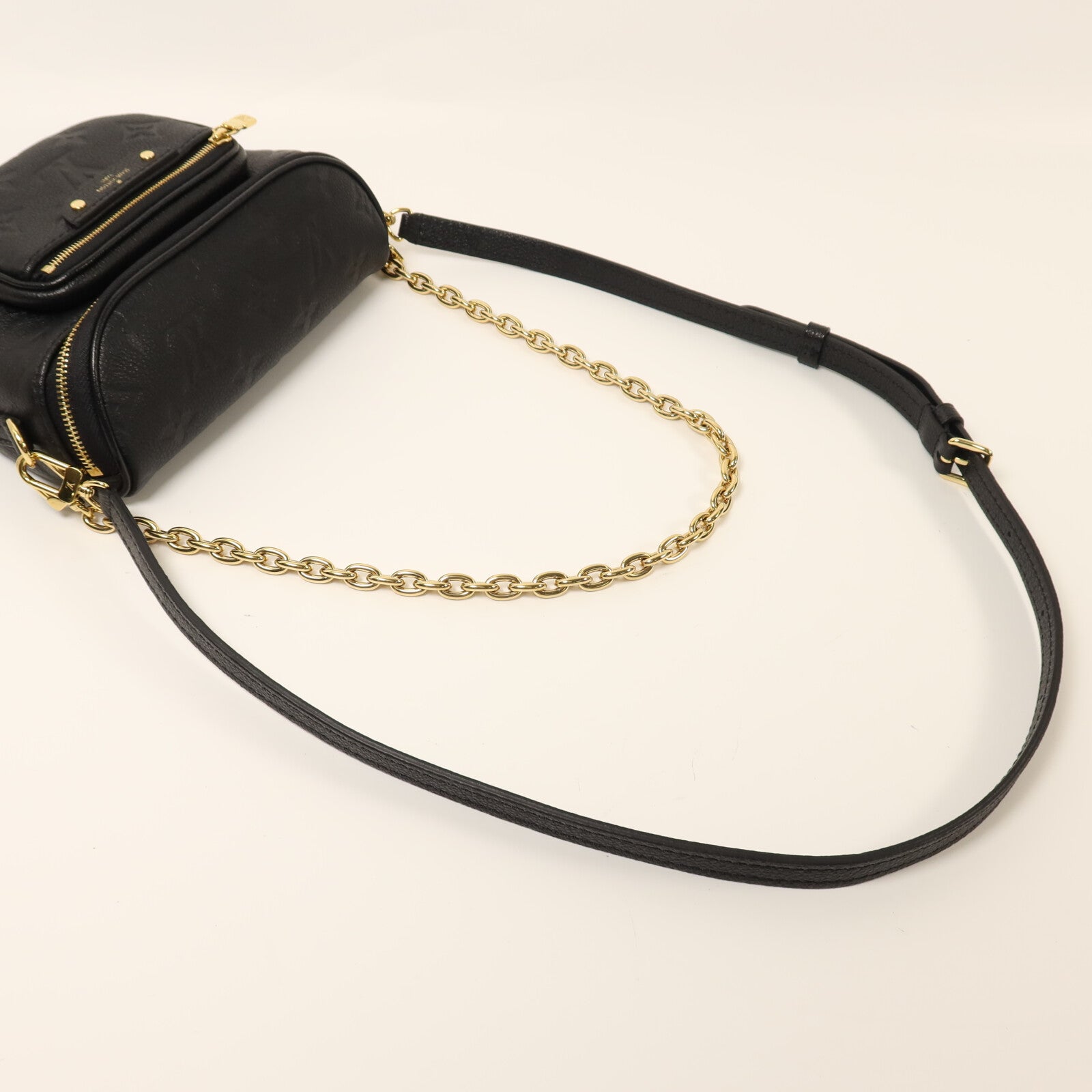 LOUIS VUITTON Monogram Empreinte Mini Bumbag金扣手挽肩背兩用袋