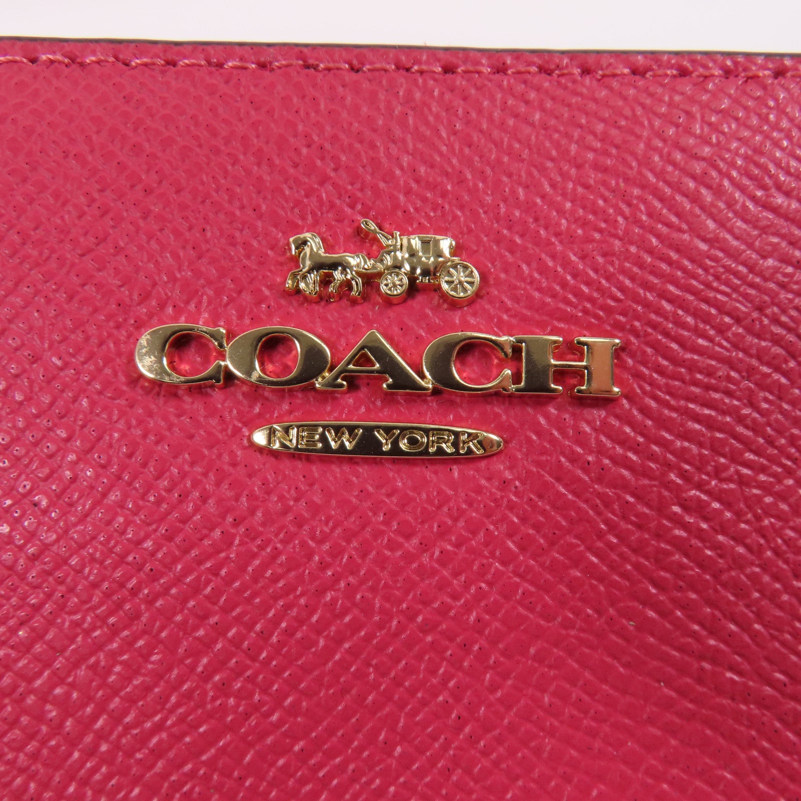 COACH 牛皮皮革Pouch金扣手拿包