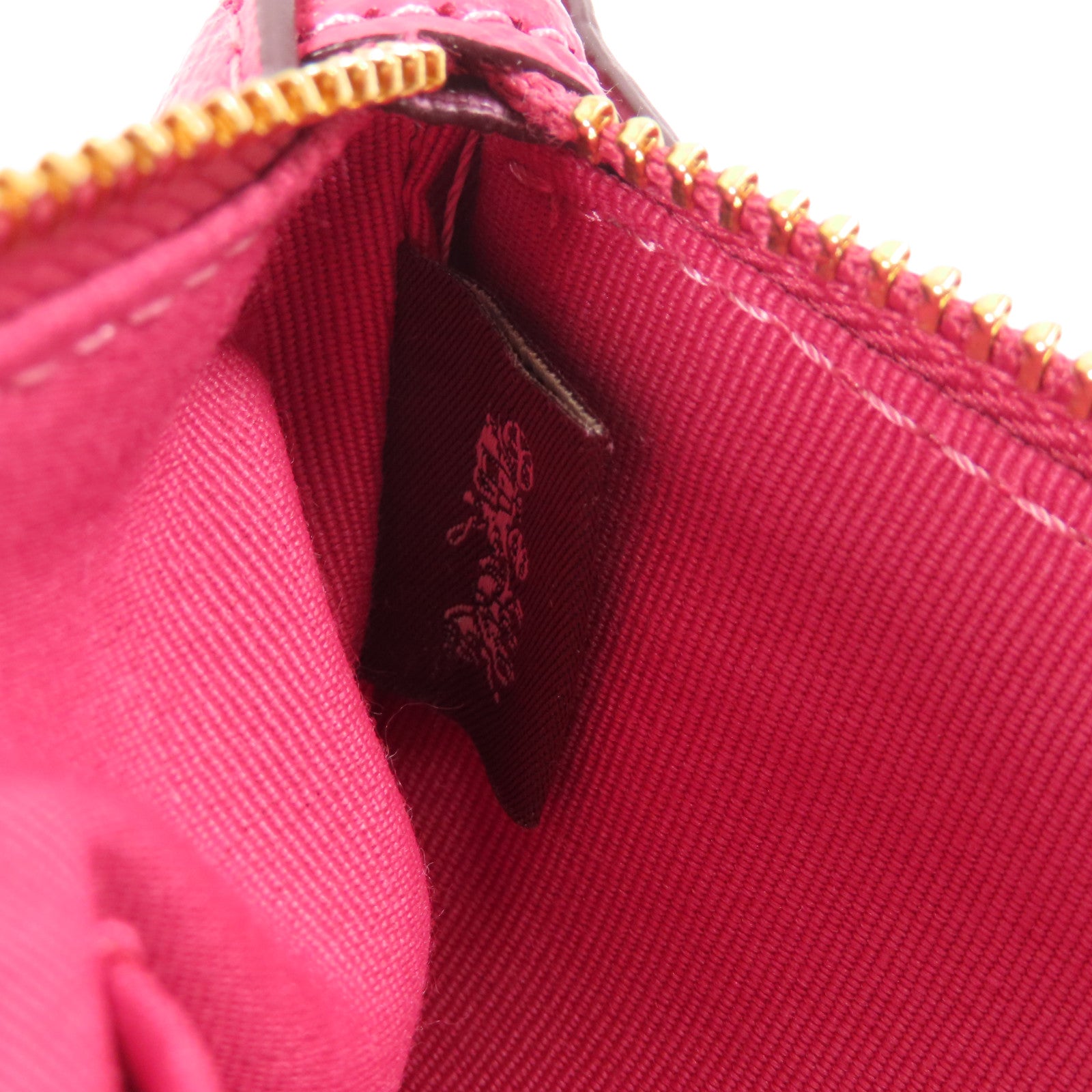 COACH 牛皮皮革Pouch金扣手拿包