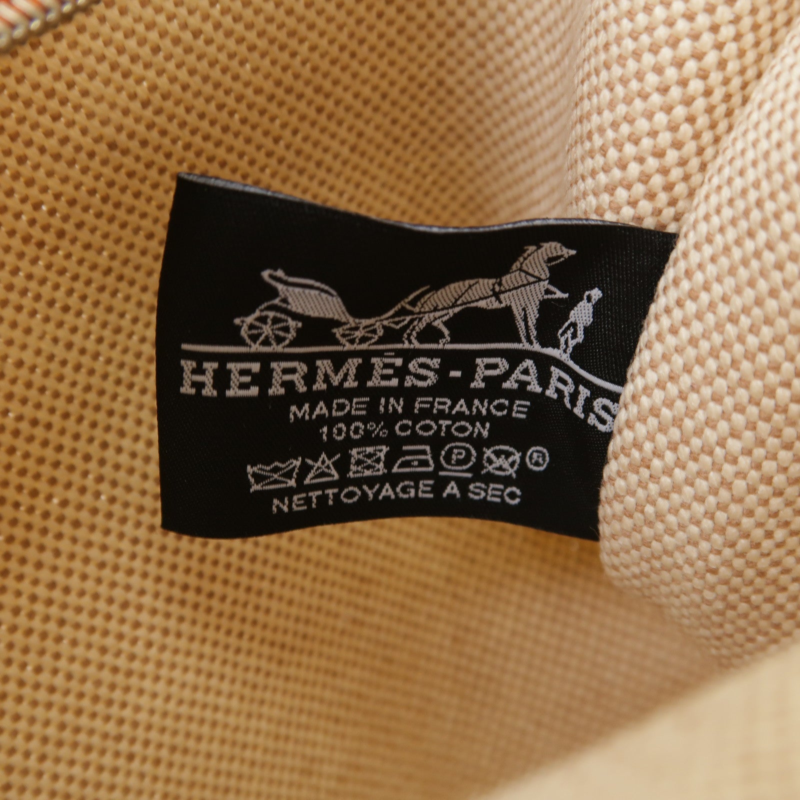 HERMES 帆布Bain銀扣手拿包米色/橙色