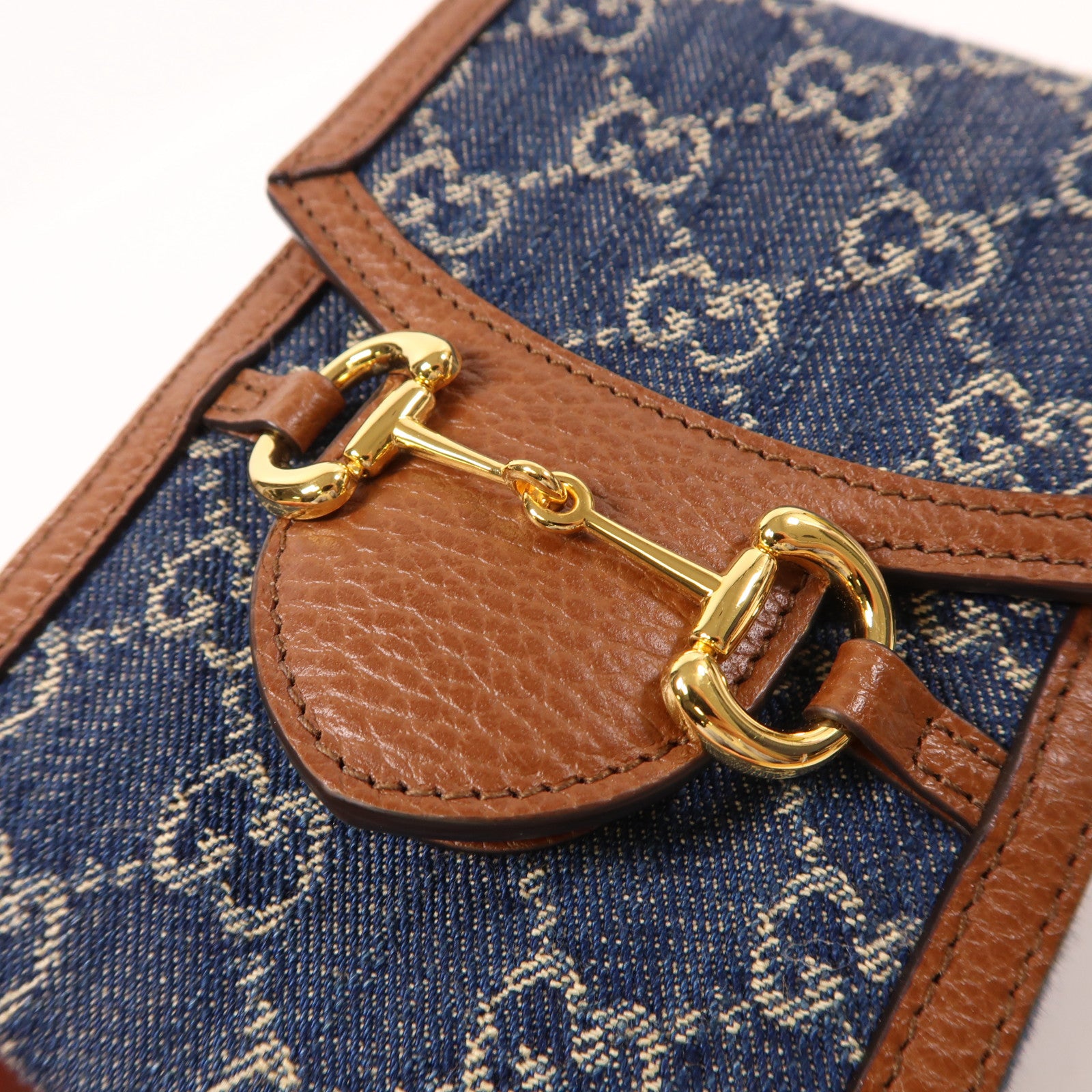 GUCCI 牛仔布/皮革Superme Horsebit 1955金扣肩背袋藍色/棕色