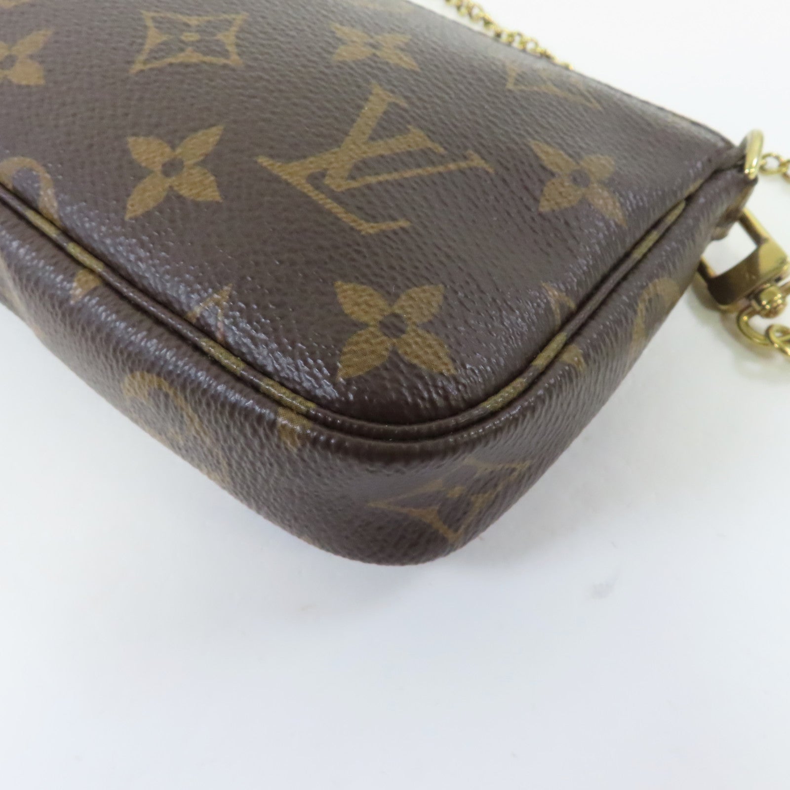 LOUIS VUITTON Monogram Mini Pochette Accessories金扣手拿包啡色