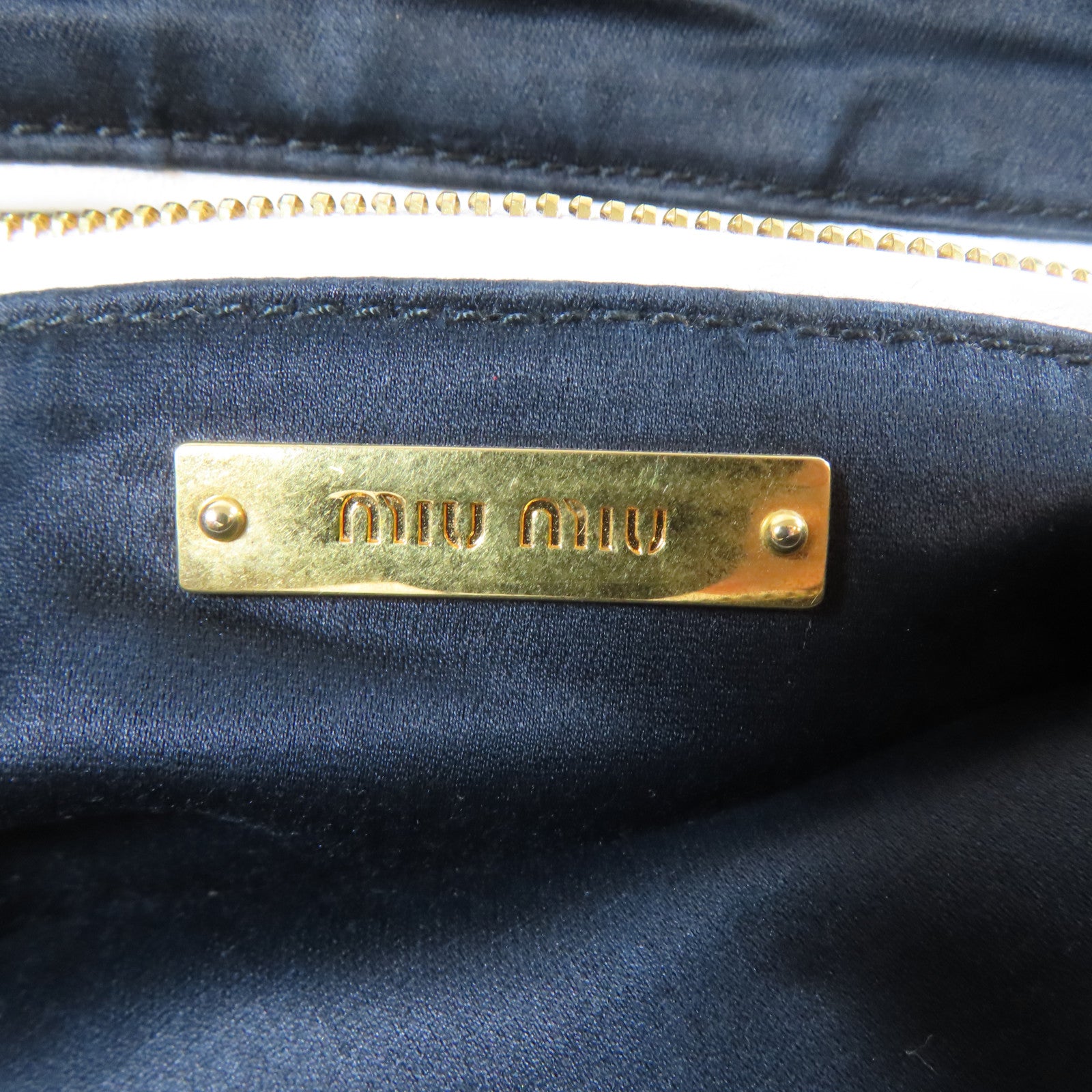 Miu Miu 【激減優惠】牛皮皮革Clutch Pouch With Handle金扣手拿包白色