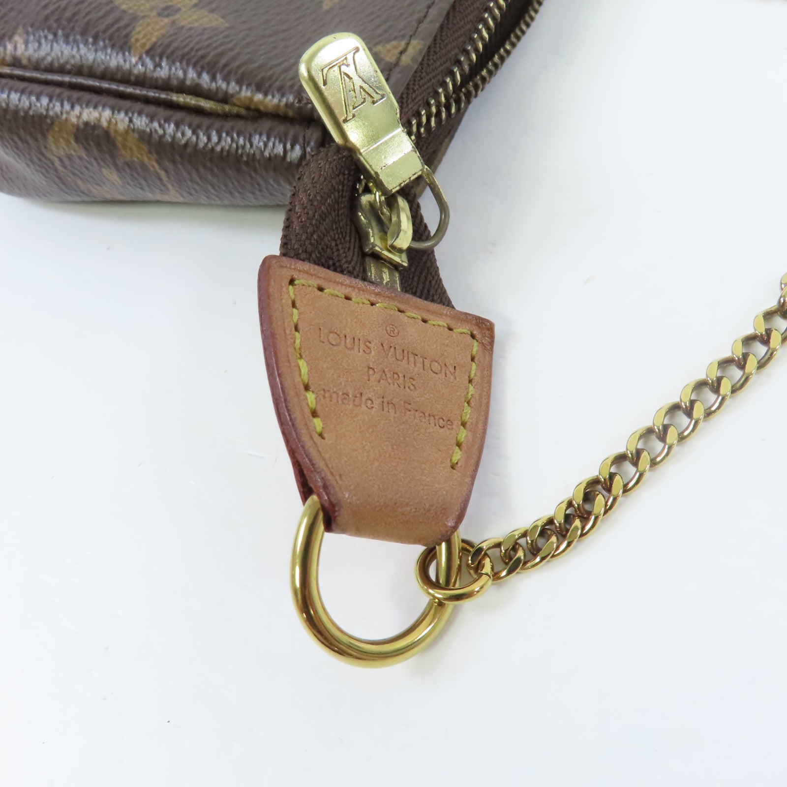 LOUIS VUITTON Monogram Mini Pochette Accessories金扣手拿包啡色