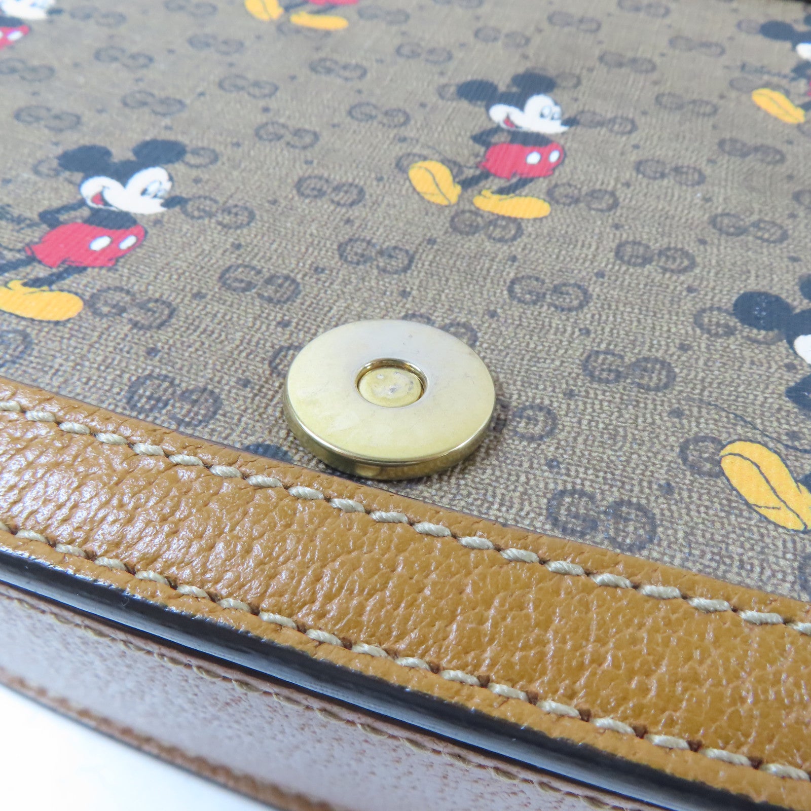 GUCCI 塗層帆布Disney Collabo GG Supreme金扣肩背袋啡色