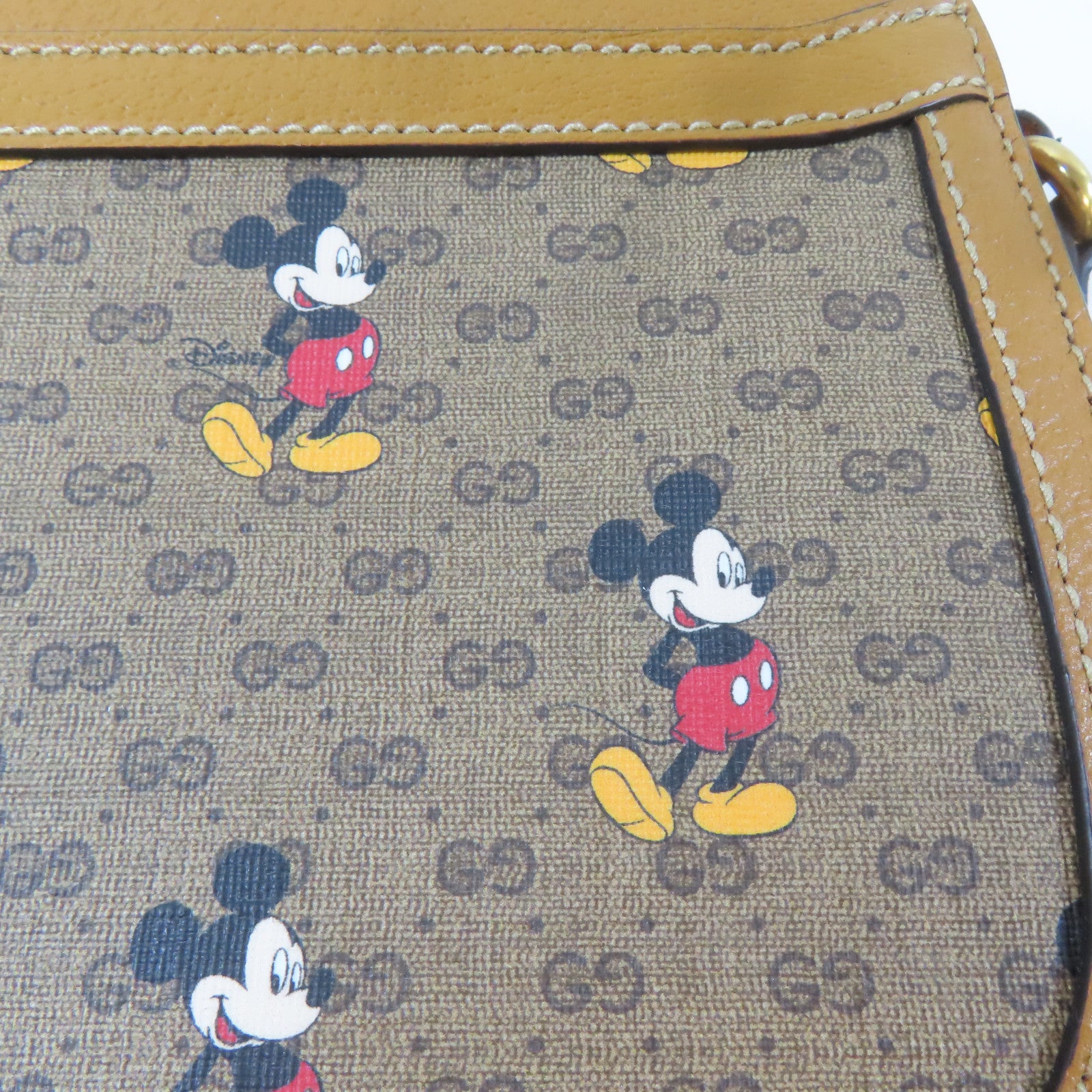 GUCCI 塗層帆布Disney Collabo GG Supreme金扣肩背袋啡色