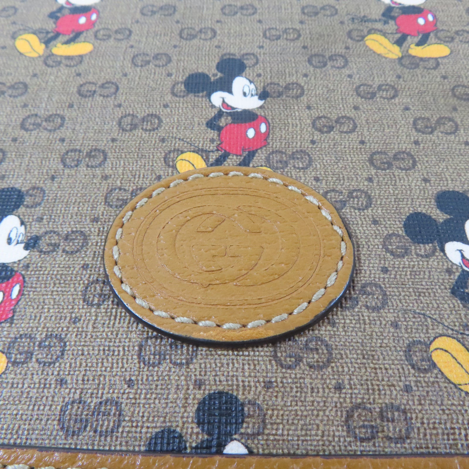 GUCCI 塗層帆布Disney Collabo GG Supreme金扣肩背袋啡色