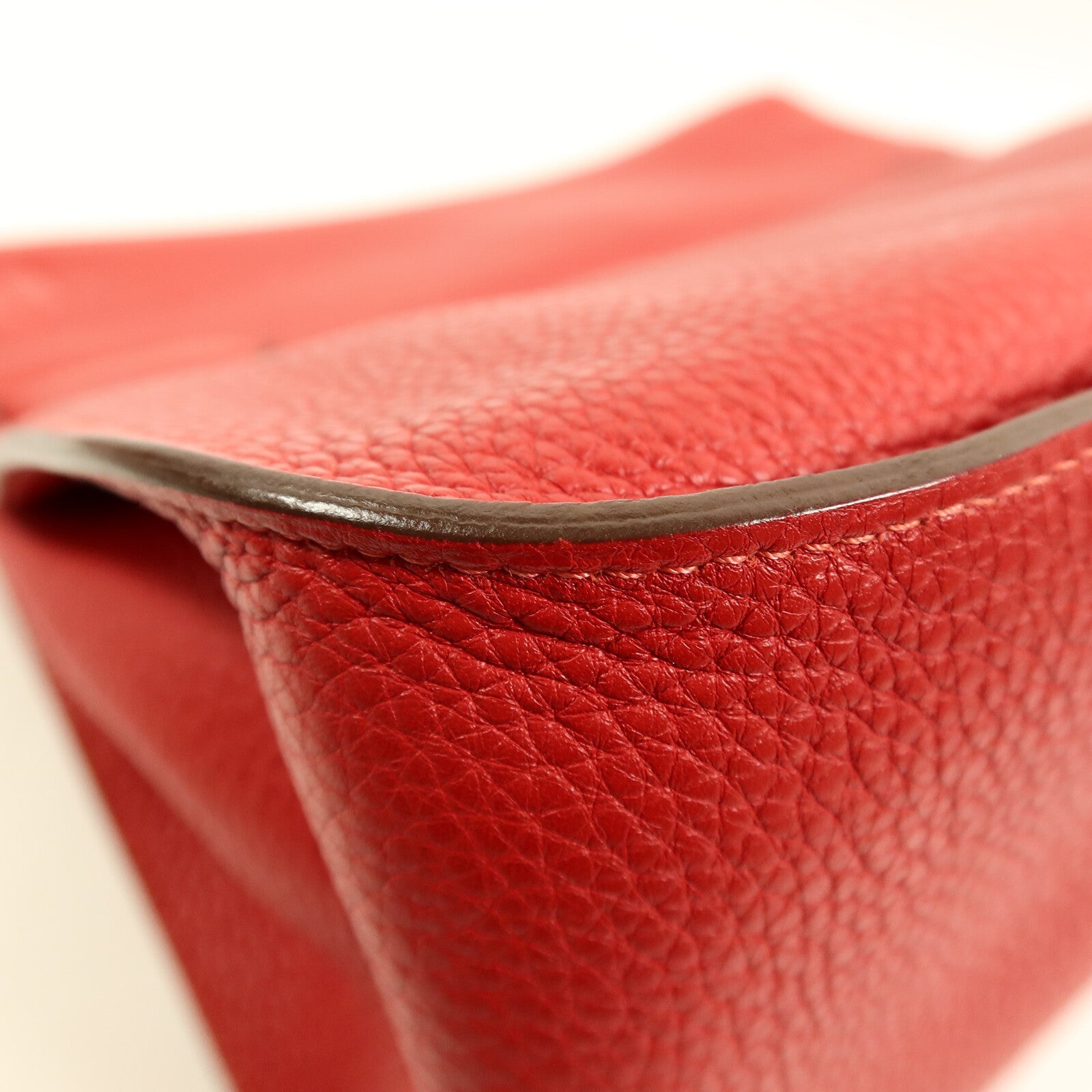 HERMES Togo皮革Jypsiere 34肩背袋Rouge Casaque