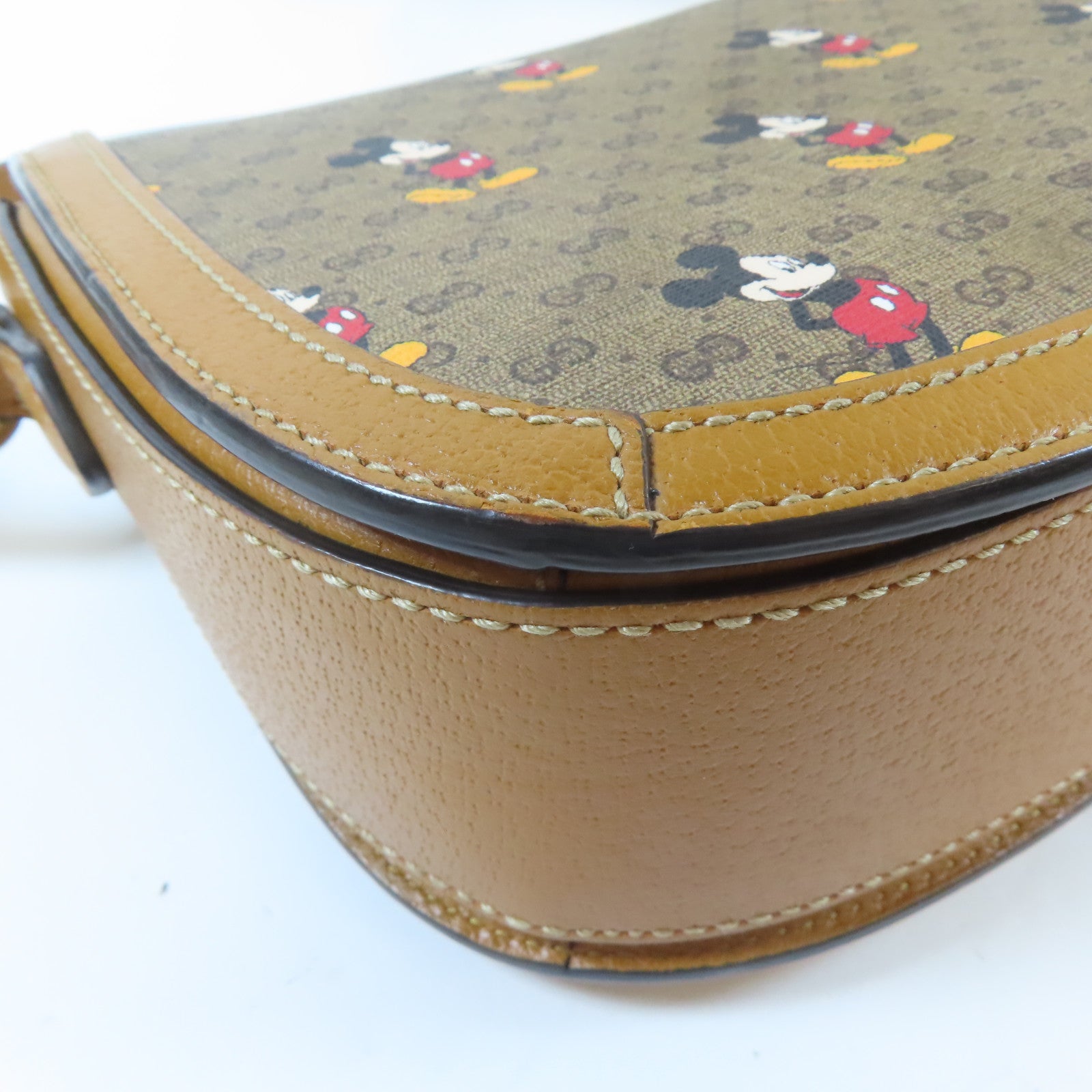 GUCCI 塗層帆布Disney Collabo GG Supreme金扣肩背袋啡色