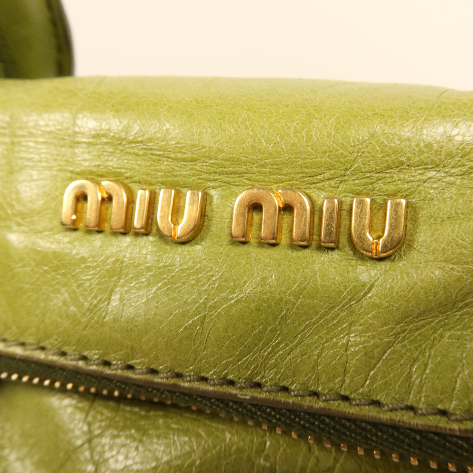 Miu Miu 牛皮皮革Vitello Lux金扣手挽肩背兩用袋