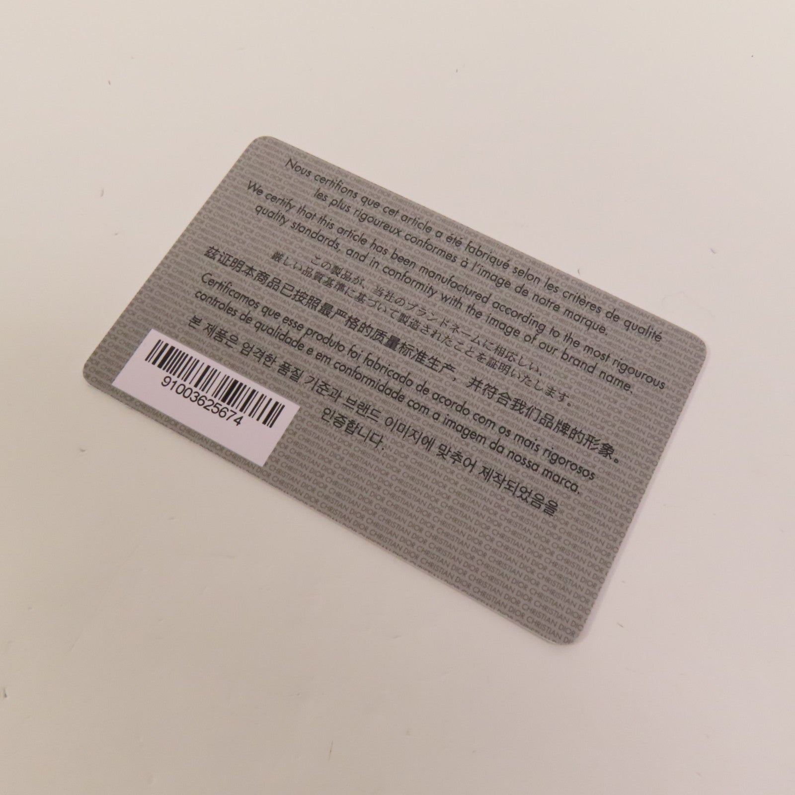 Dior 牛皮皮革Travel Nomad Pouch Small金扣手挽袋