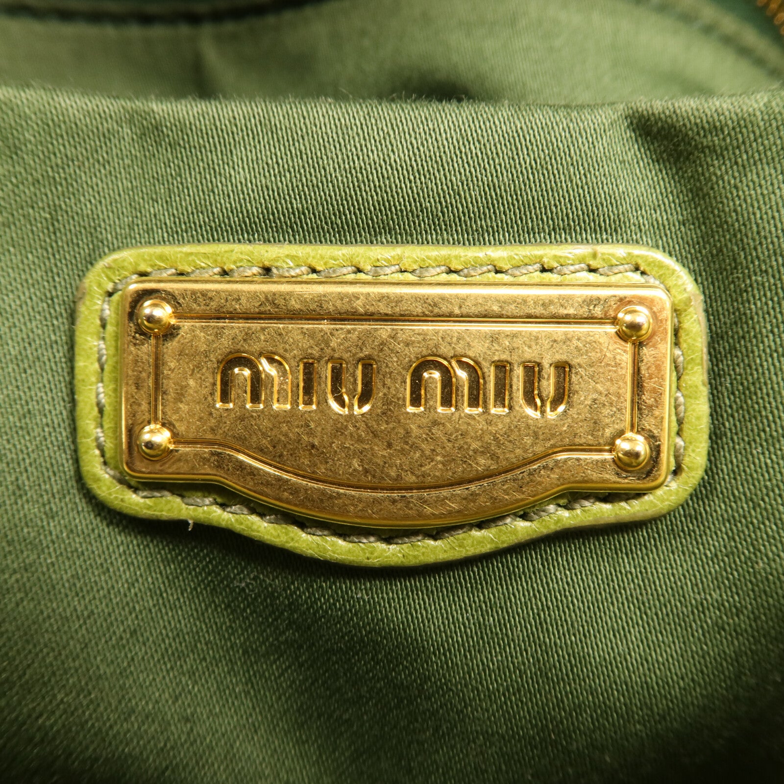 Miu Miu 牛皮皮革Vitello Lux金扣手挽肩背兩用袋