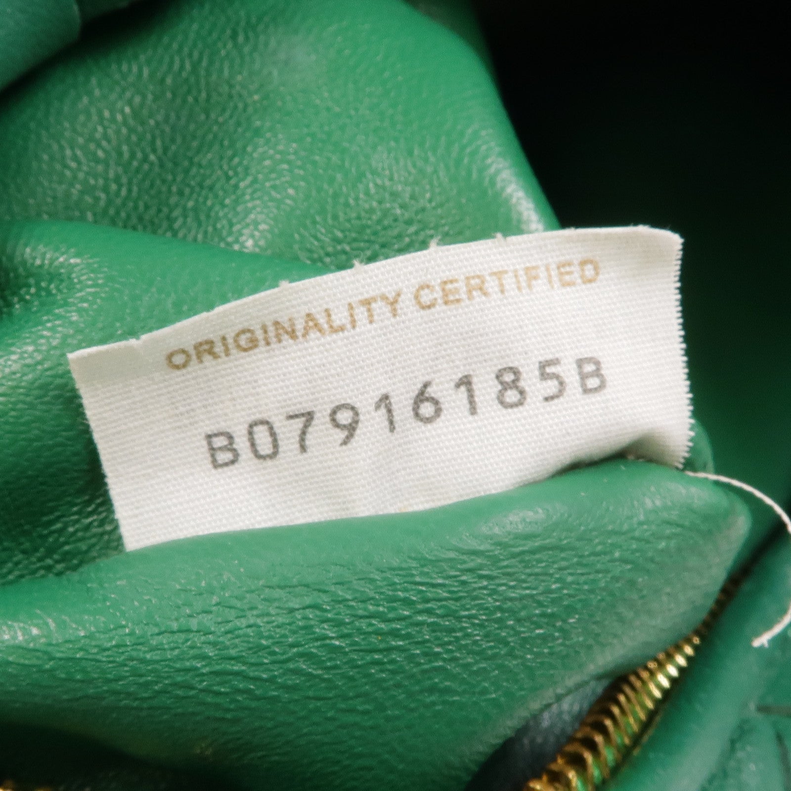 BOTTEGA VENETA 牛皮皮革Mini Jodie金扣手挽袋