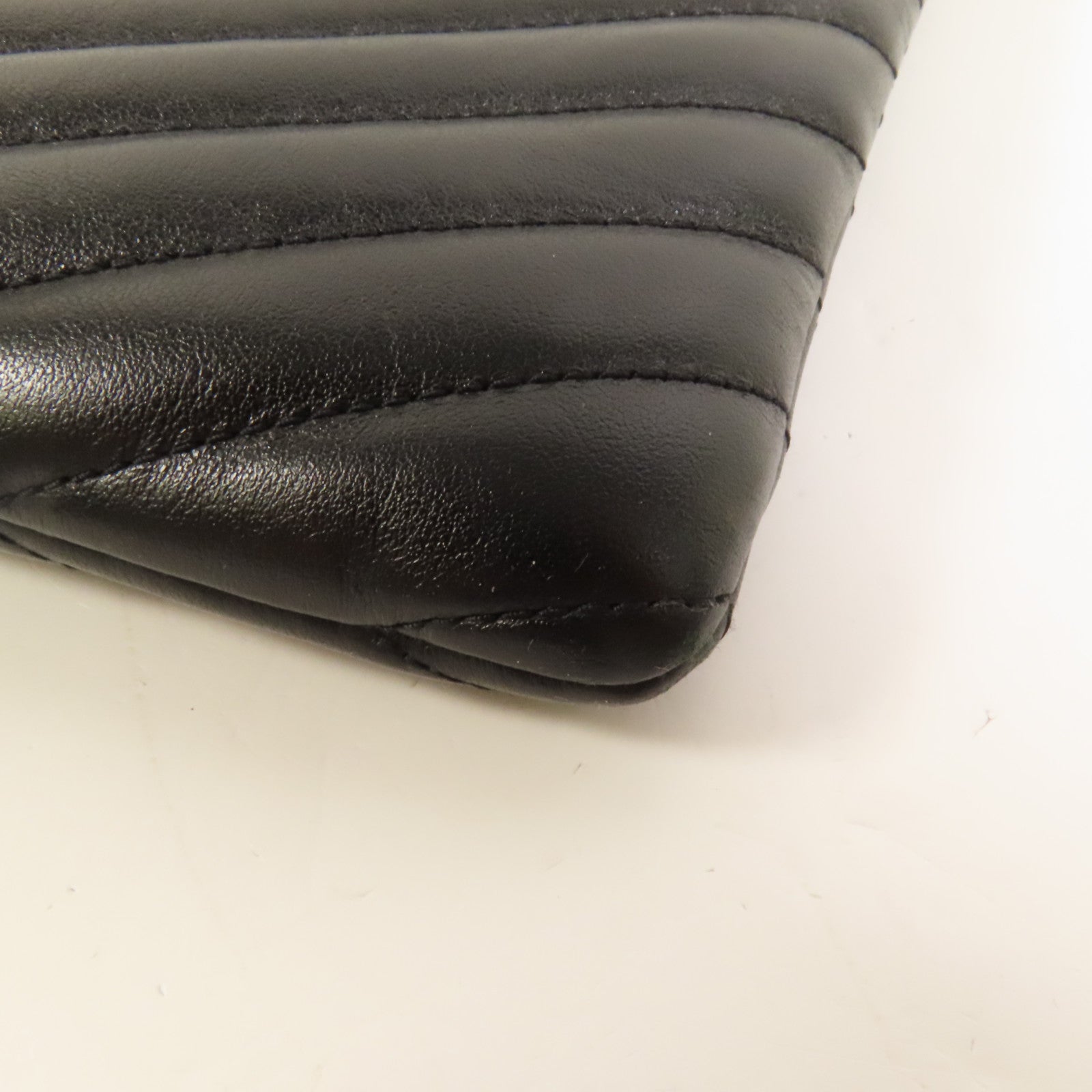 YVES SAINT LAURENT 牛皮皮革Matelasse銀扣手拿包