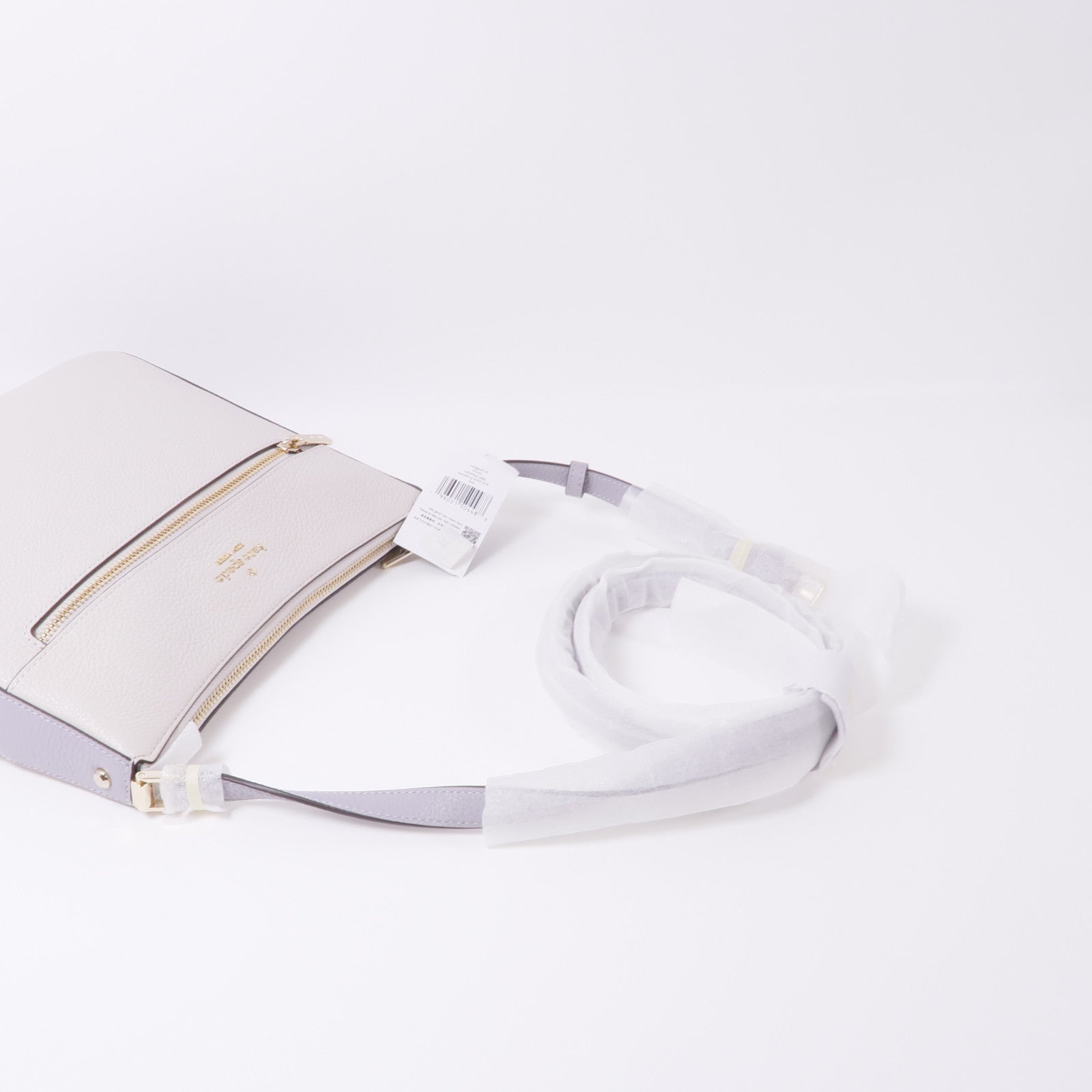 Kate Spade 牛皮皮革Lena Swingpack金扣肩背袋