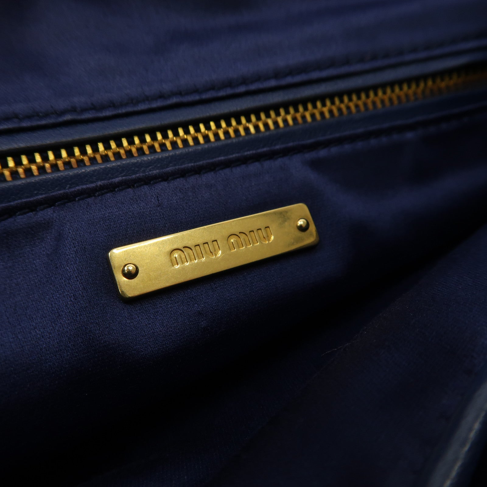 Miu Miu 【激減優惠】牛皮皮革Clutch Bag金扣手拿包藍色