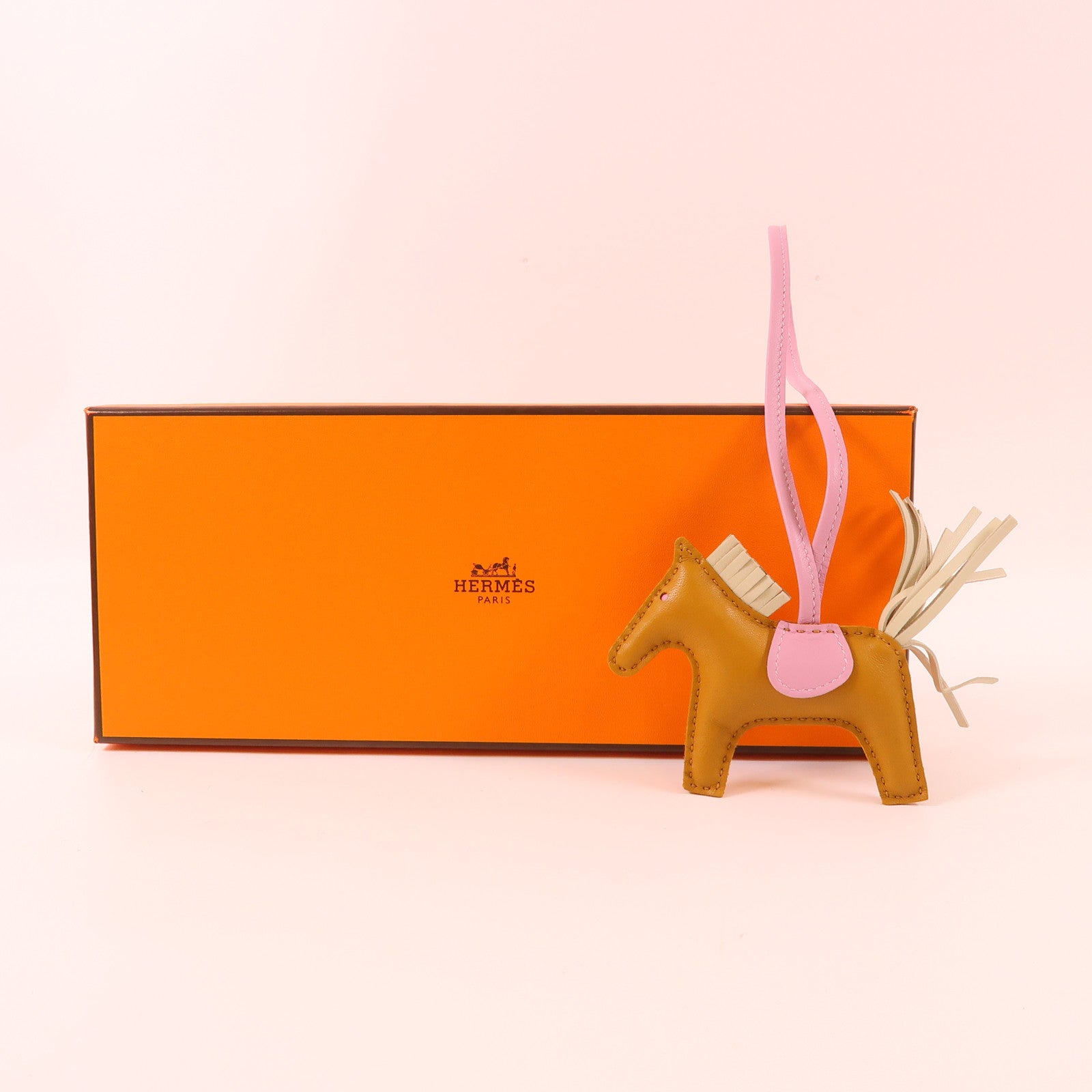 HERMES Swift皮革Rodeo PM掛飾Sesame/Mauve Sylvestre