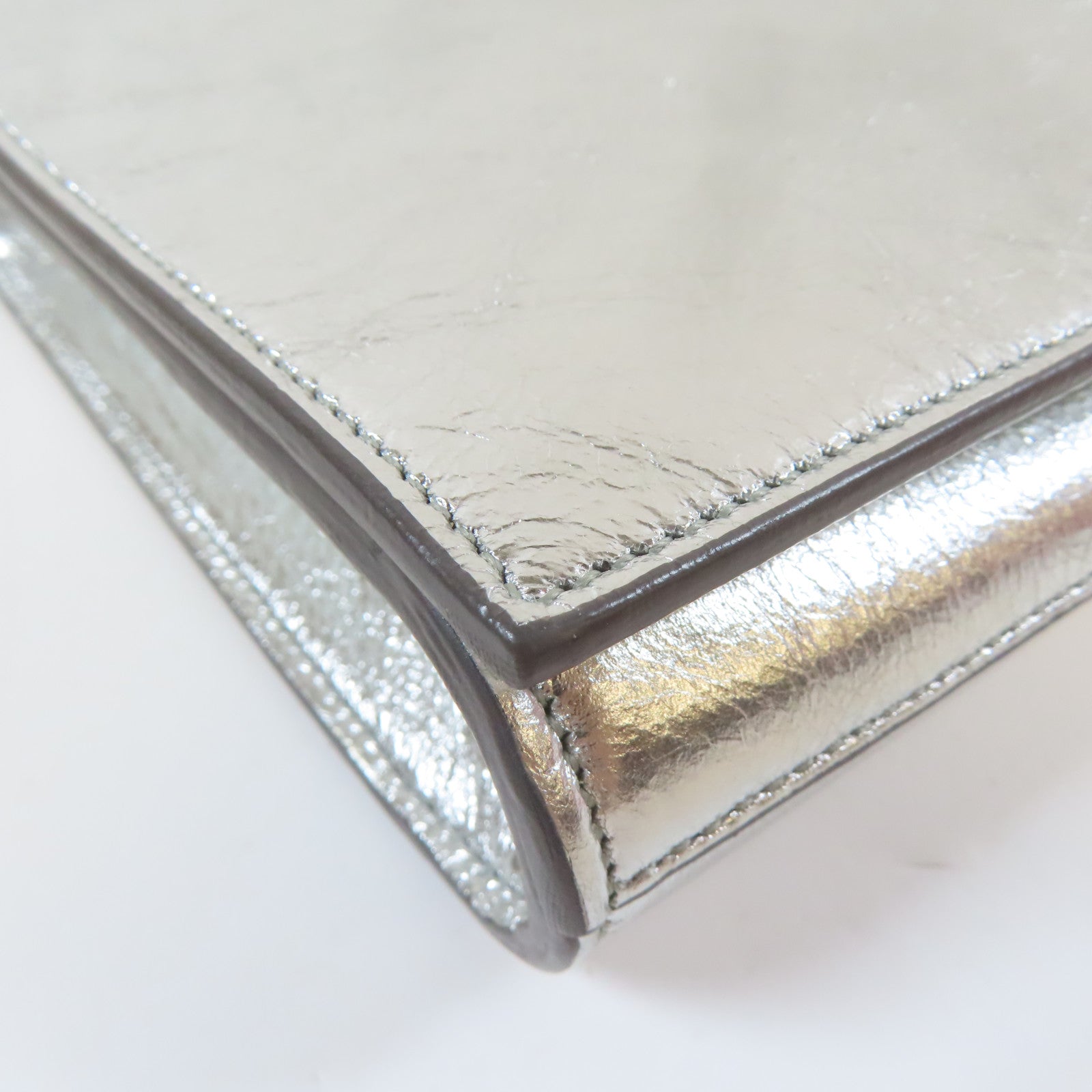 YVES SAINT LAURENT 牛皮皮革Clutch Bag銀扣手拿包銀色