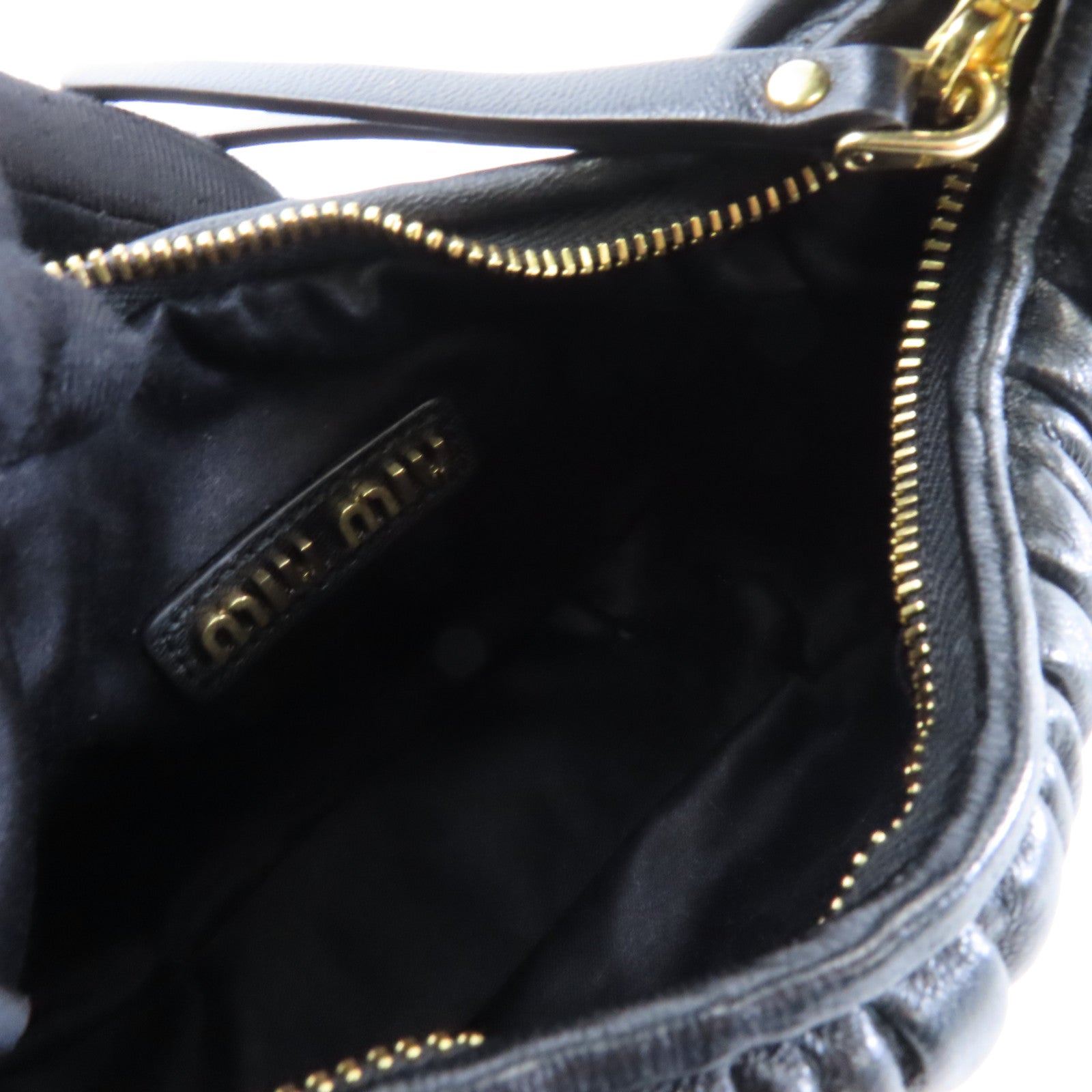 Miu Miu 羊皮皮革Wander Matelasse金扣手挽肩背兩用袋黑色