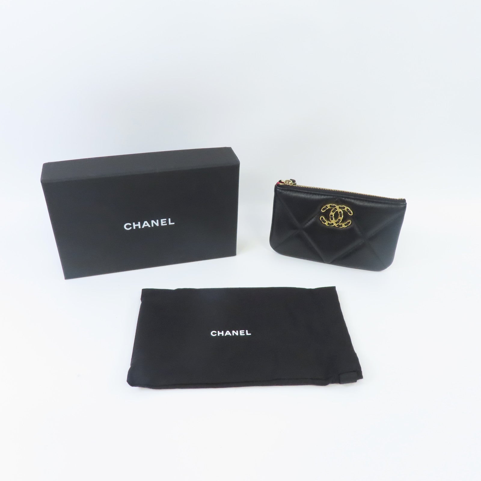CHANEL 菱格羊皮皮革Mini Pouch金扣手拿包黑色