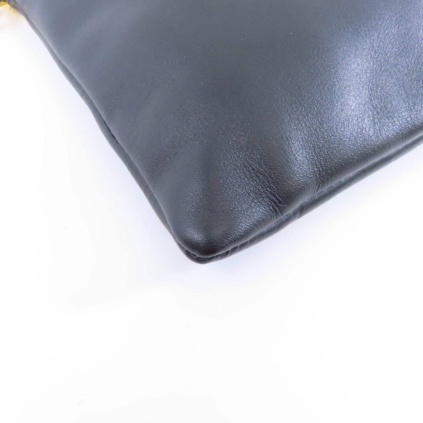 Miu Miu 牛皮皮革Clutch Bag金扣手拿包黑色