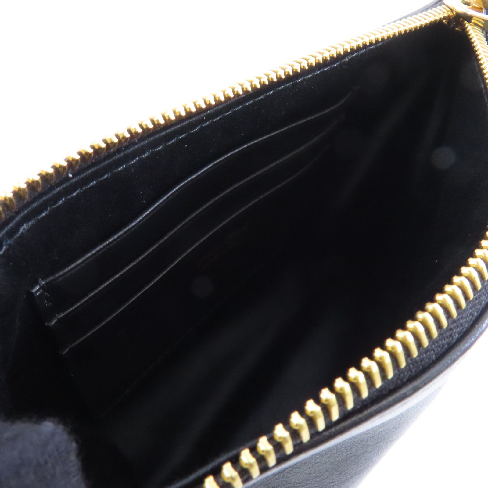 Miu Miu 牛皮皮革Clutch Bag金扣手拿包黑色
