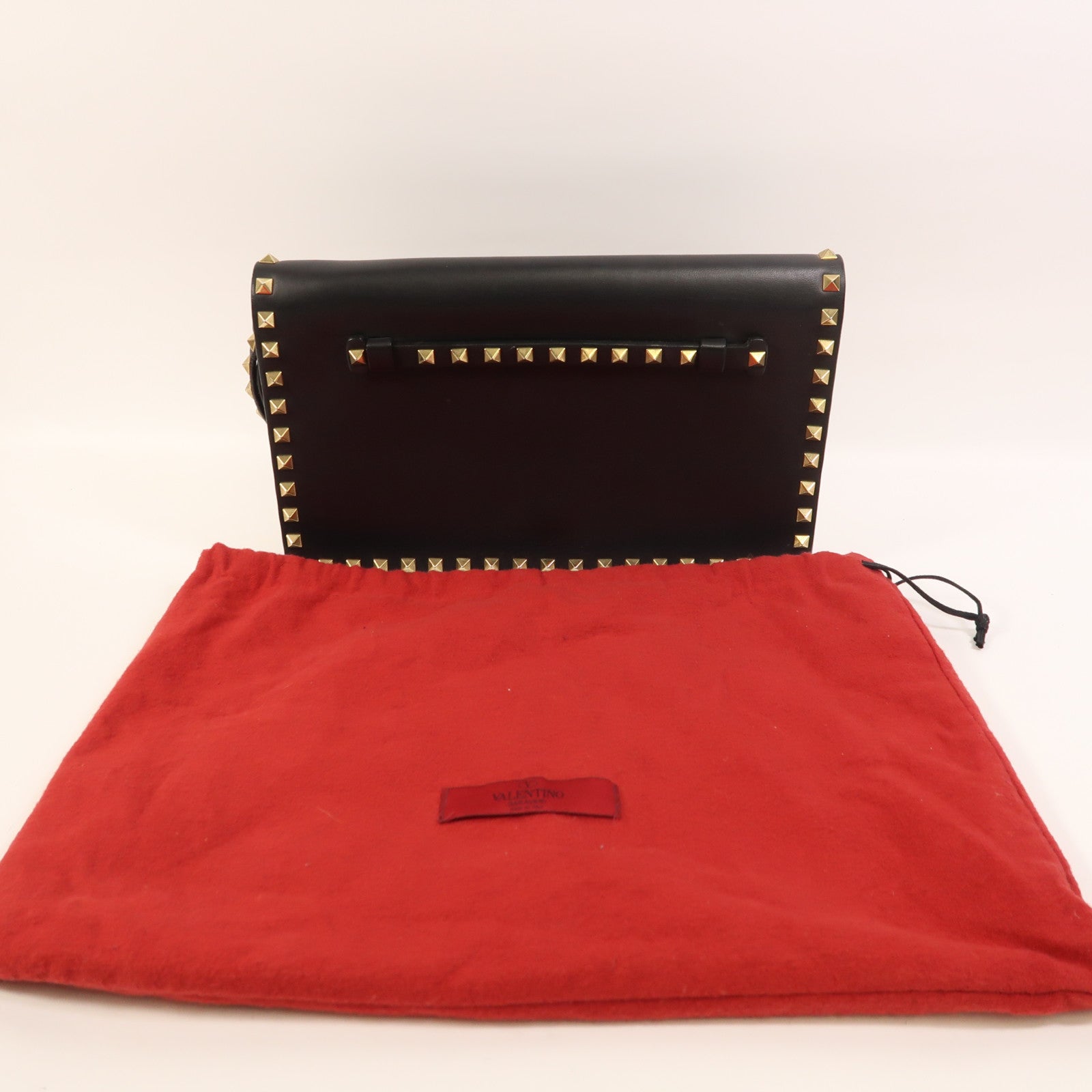 Valentino 牛皮皮革Garavani Rockstud Clutch金扣手拿包