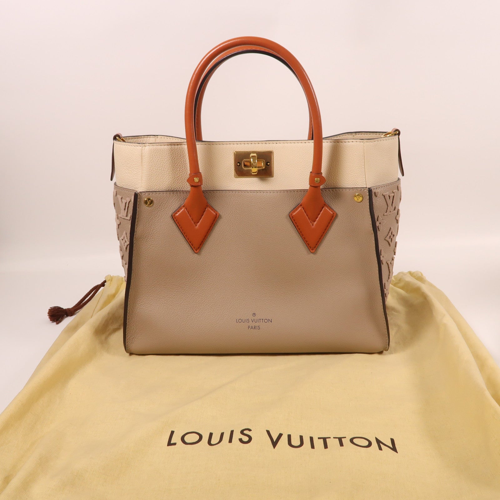 LOUIS VUITTON 牛皮皮革On My Side MM金扣手挽袋
