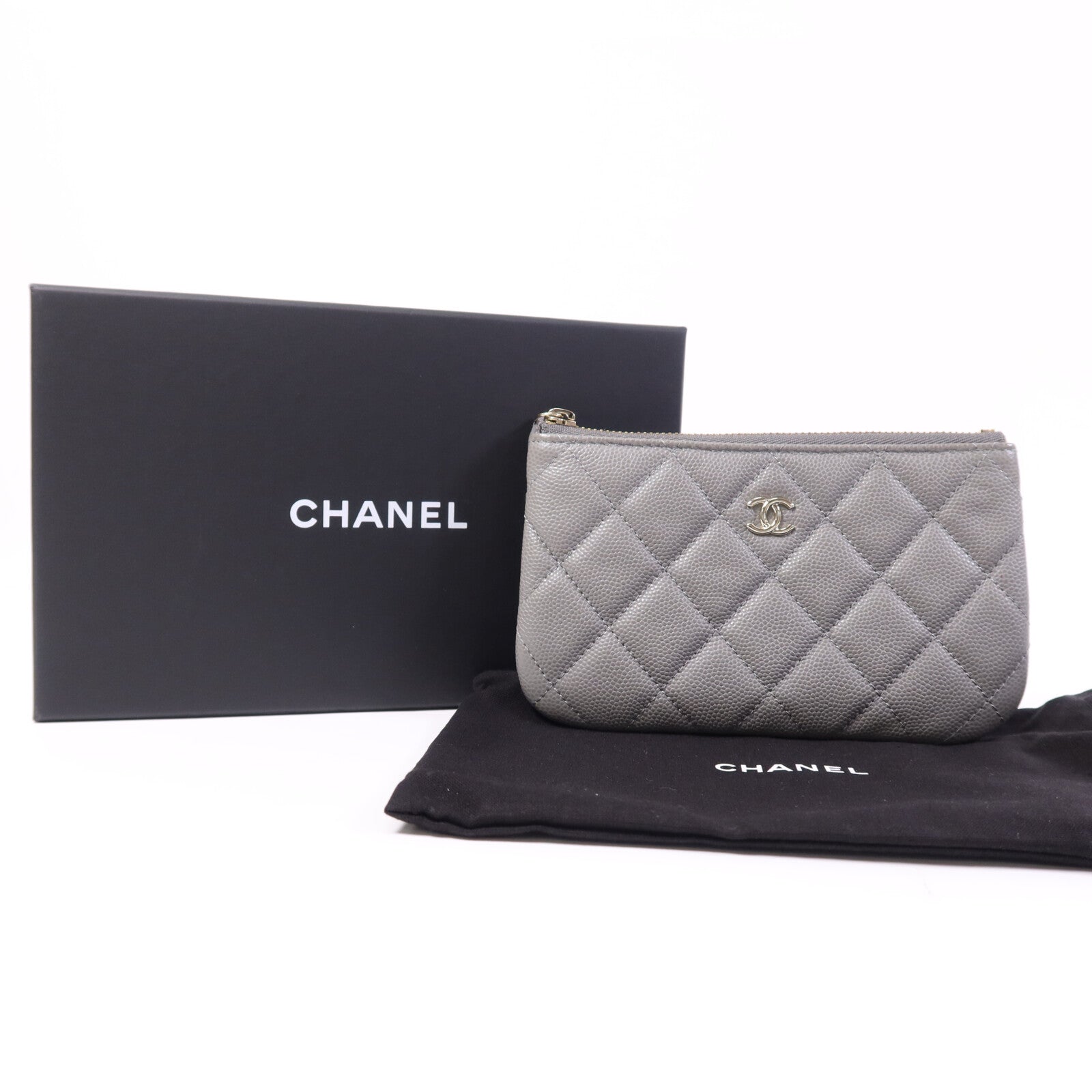 CHANEL 牛皮皮革Pouch金扣手拿包