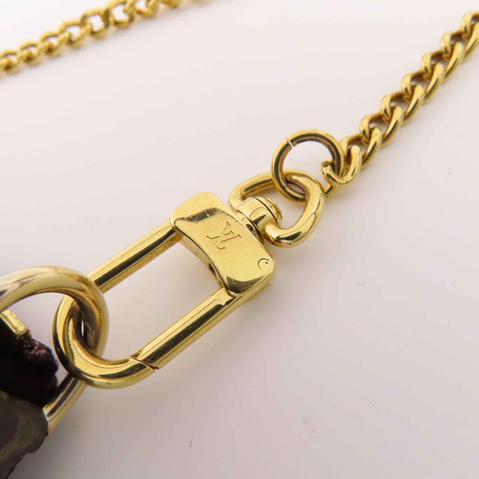 LOUIS VUITTON Monogram Mini Pochette Accessoires金扣手挽袋棕色