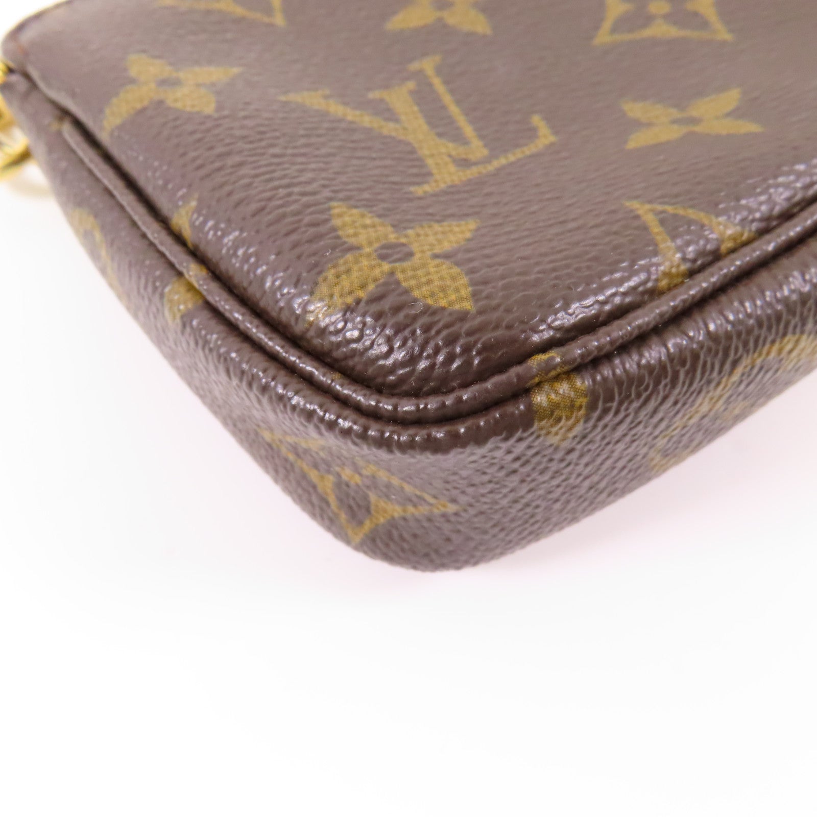 LOUIS VUITTON Monogram Mini Pochette Accessoires金扣手挽袋棕色