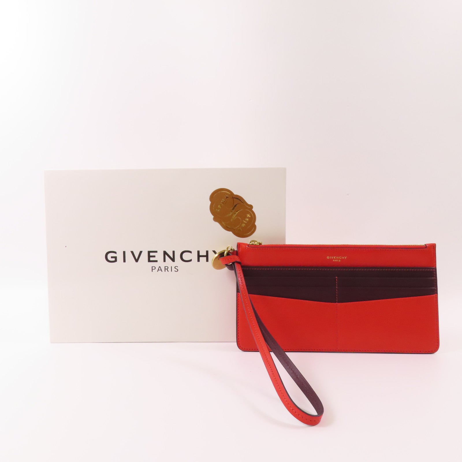 GIVENCHY 牛皮皮革Pouch金扣手拿包