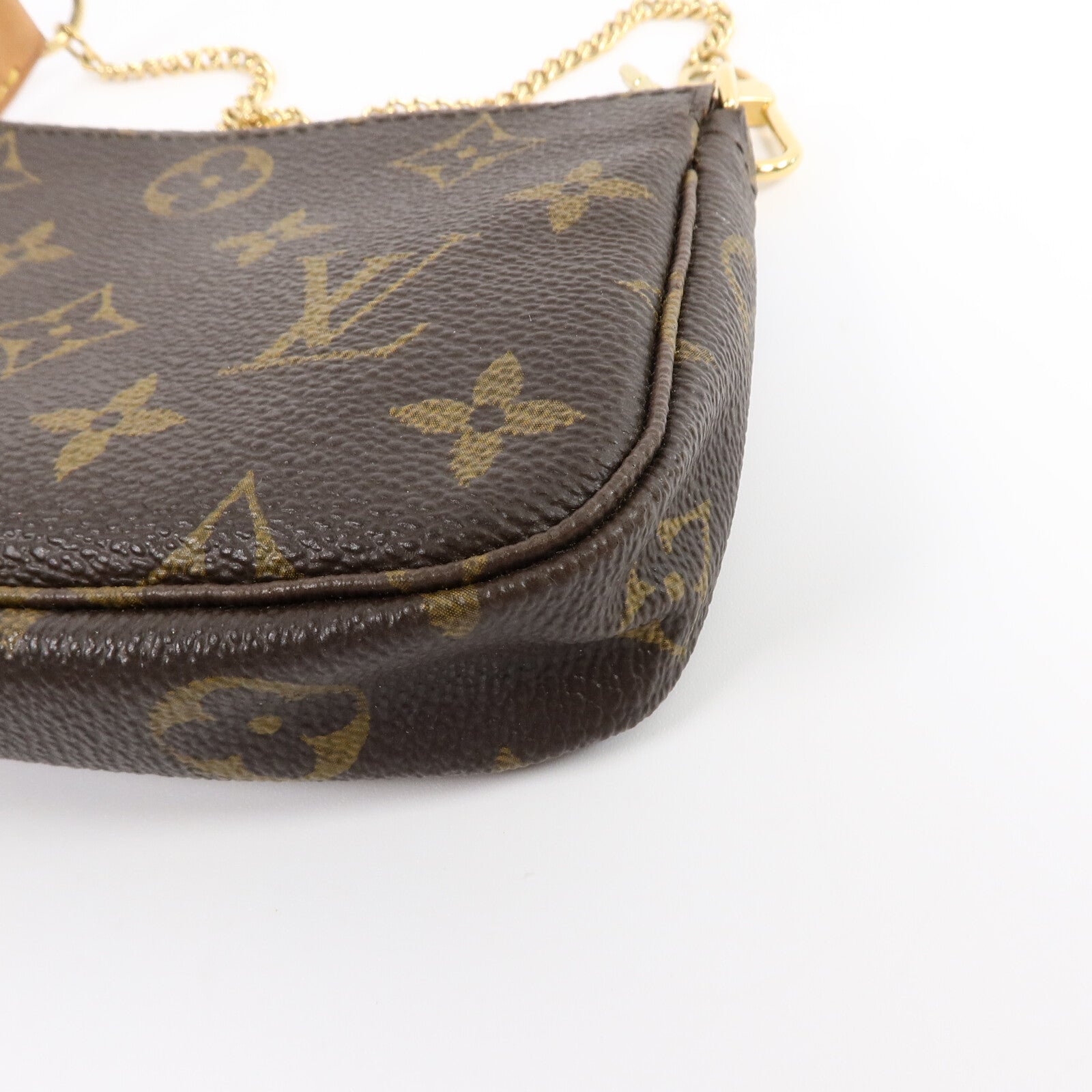 LOUIS VUITTON Monogram Mini Pochette Accessoires金扣手挽袋