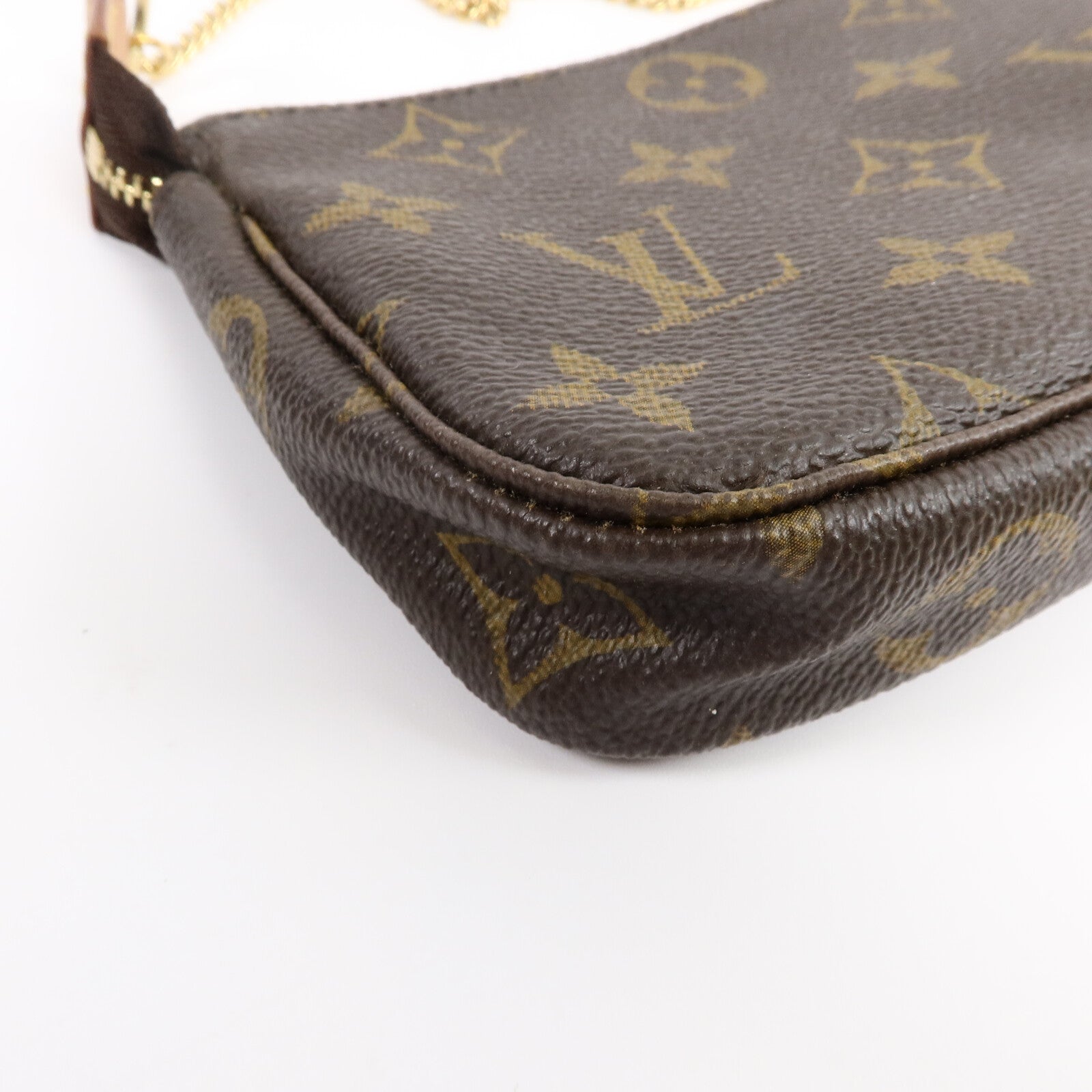 LOUIS VUITTON Monogram Mini Pochette Accessoires金扣手挽袋