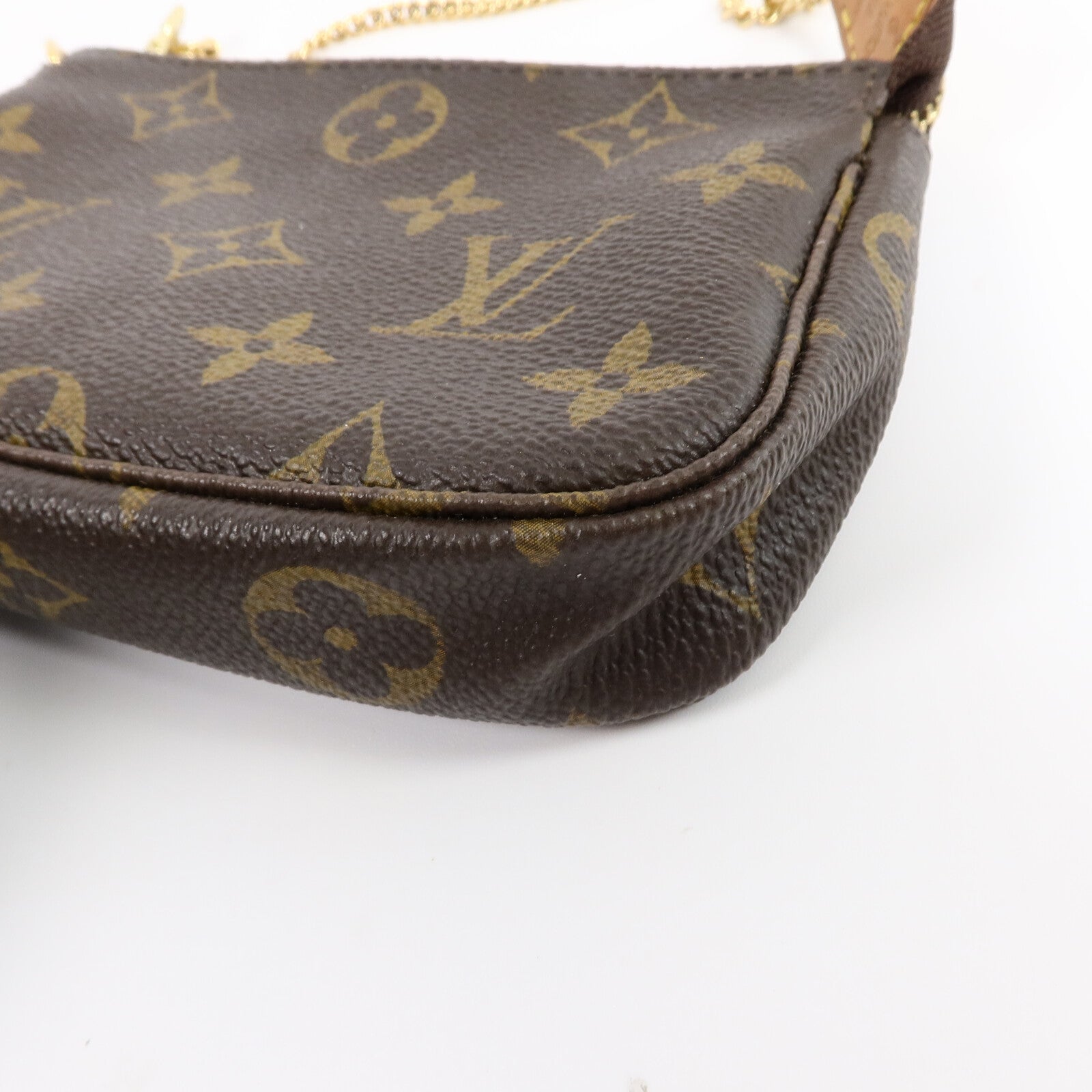 LOUIS VUITTON Monogram Mini Pochette Accessoires金扣手挽袋