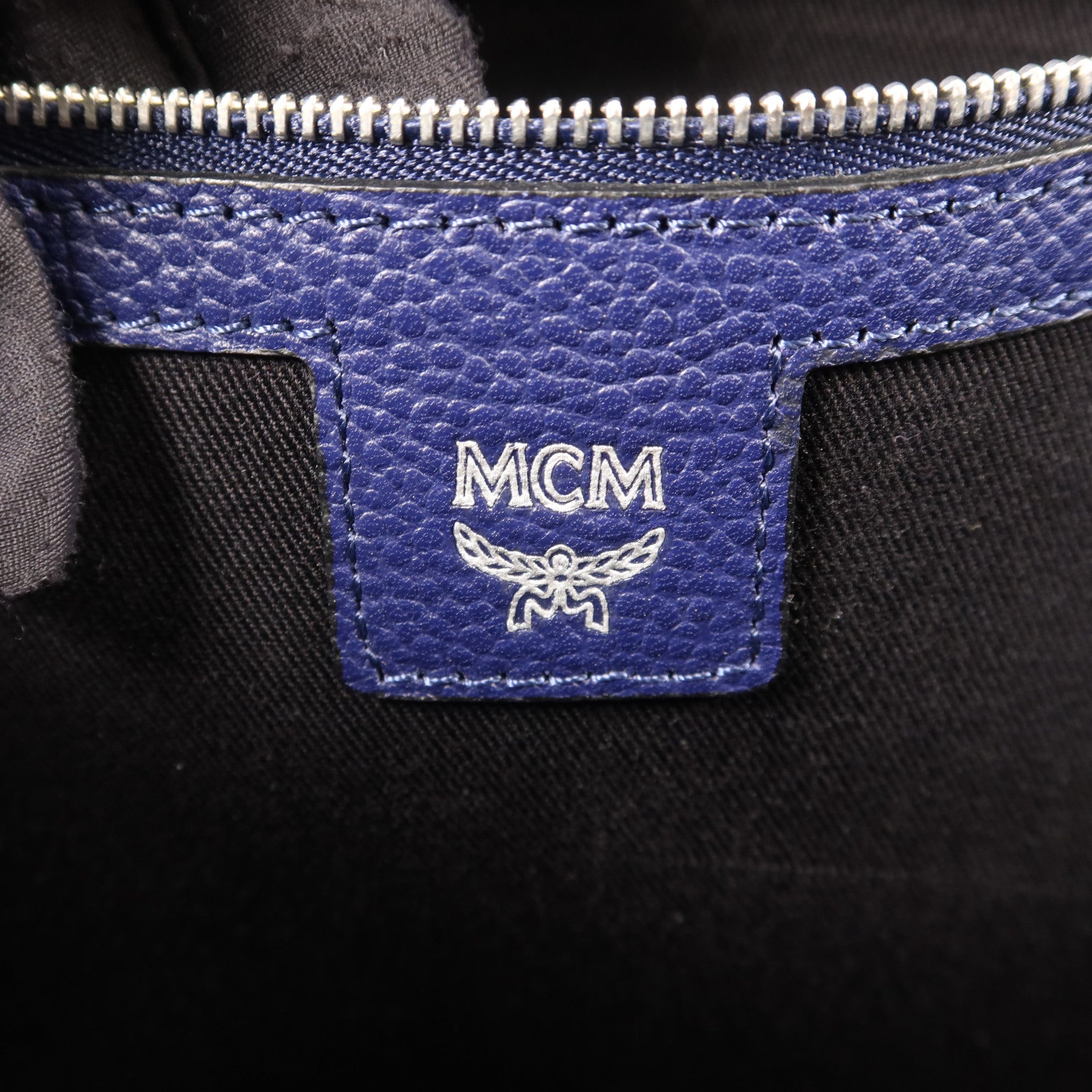 MCM 【激減優惠】牛皮皮革Pouch銀扣手拿包
