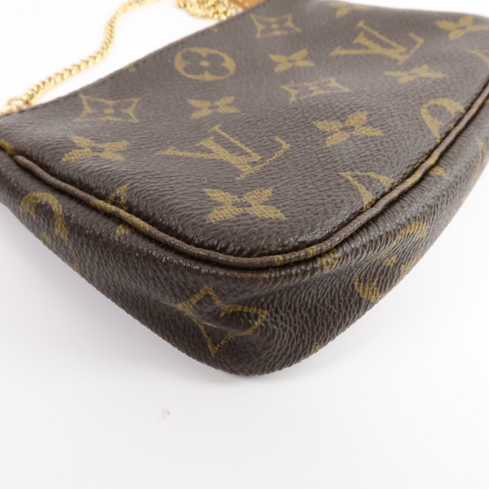 LOUIS VUITTON Monogram Mini Pochette Accessoires金扣手挽袋