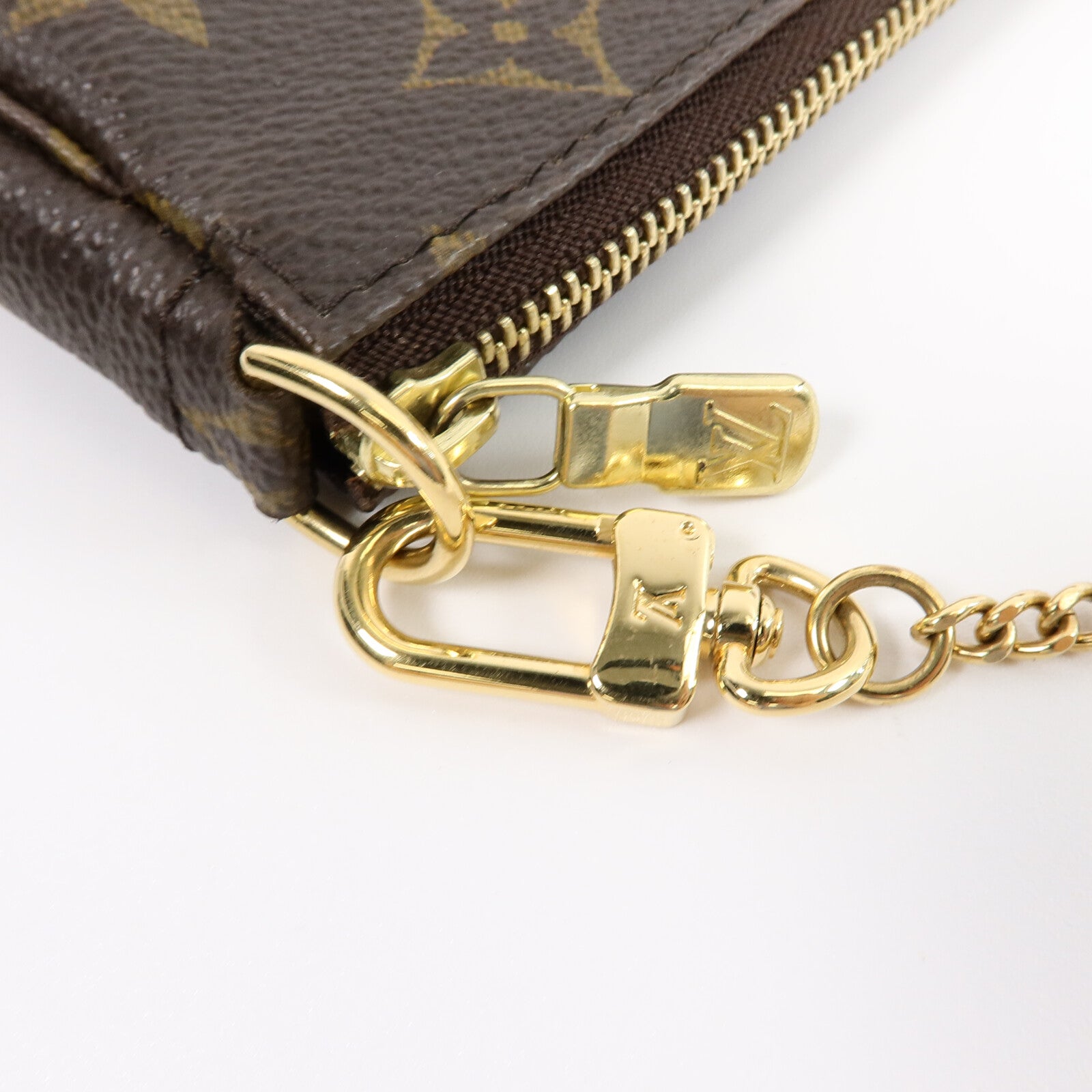 LOUIS VUITTON Monogram Mini Pochette Accessoires金扣手挽袋