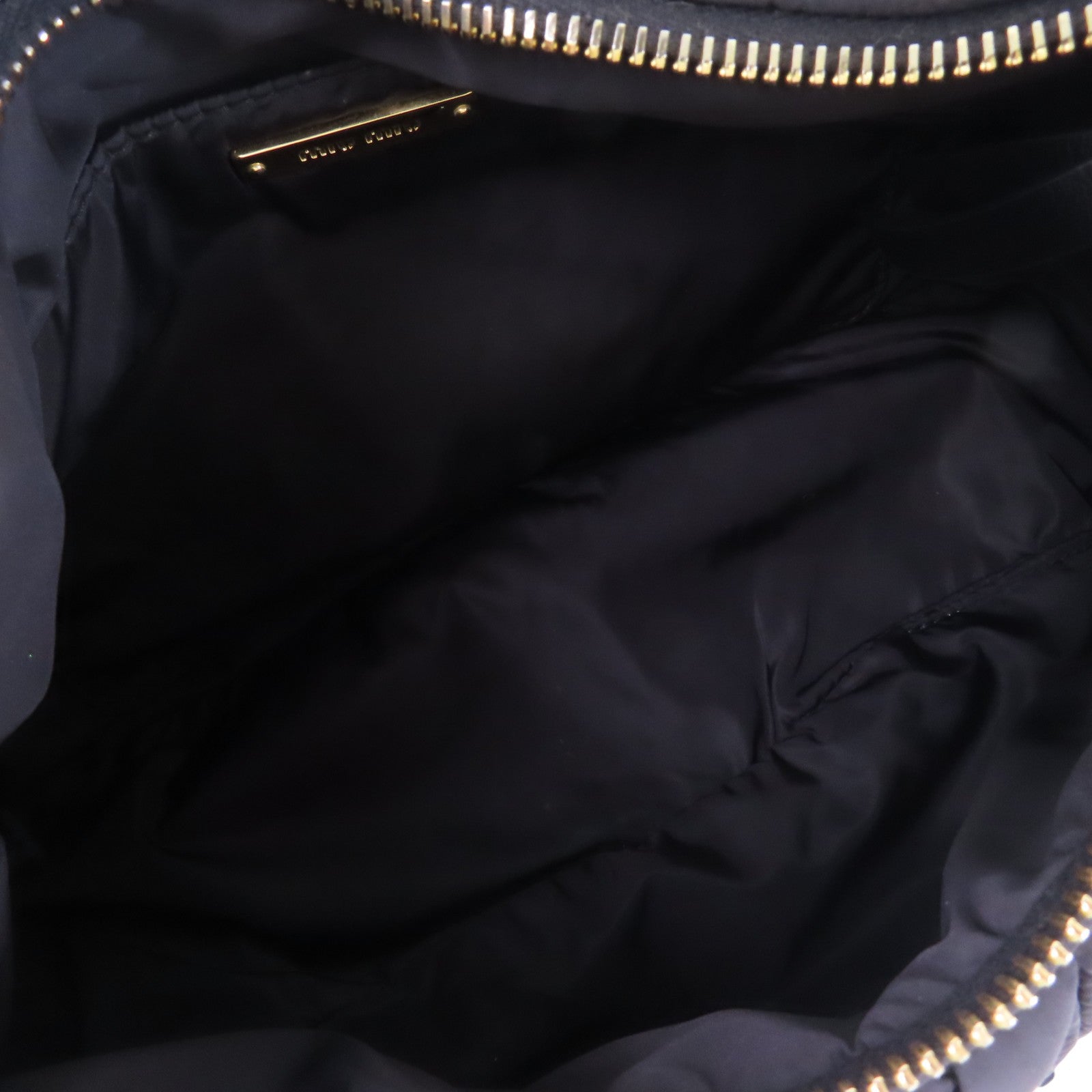 Miu Miu 尼龍Wander Matelasse金扣肩背袋