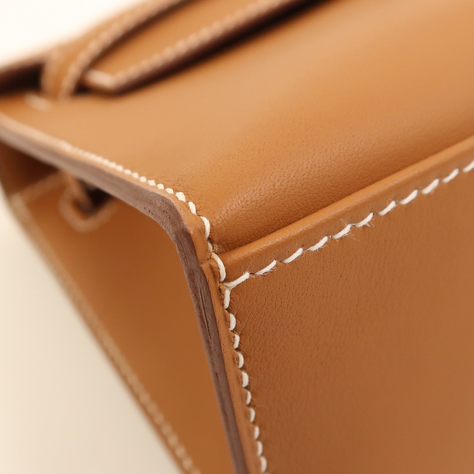 HERMES Swift皮革Kelly Pochette金扣手挽袋