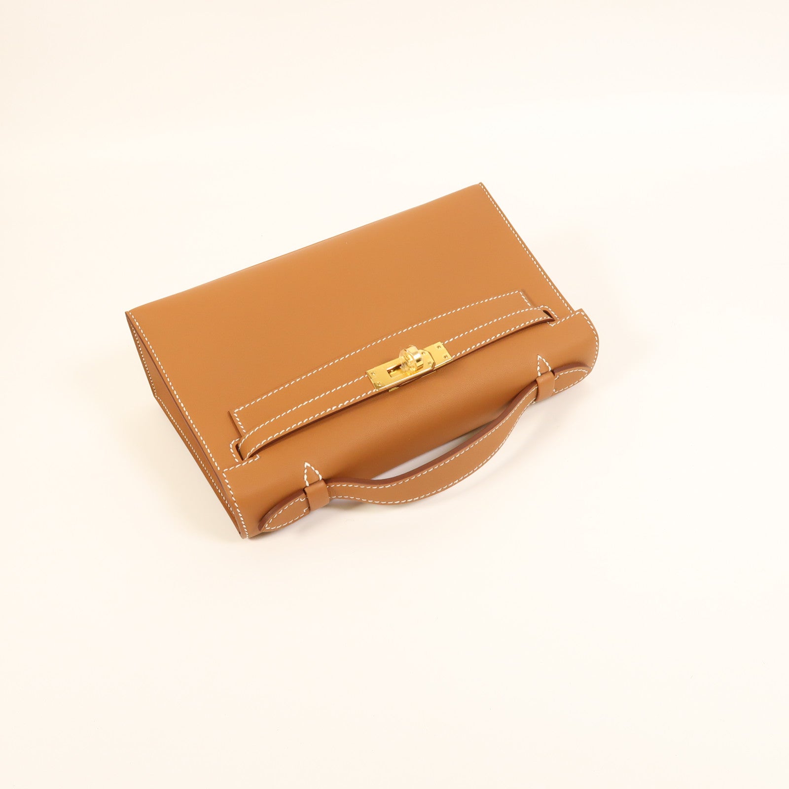 HERMES Swift皮革Kelly Pochette金扣手挽袋