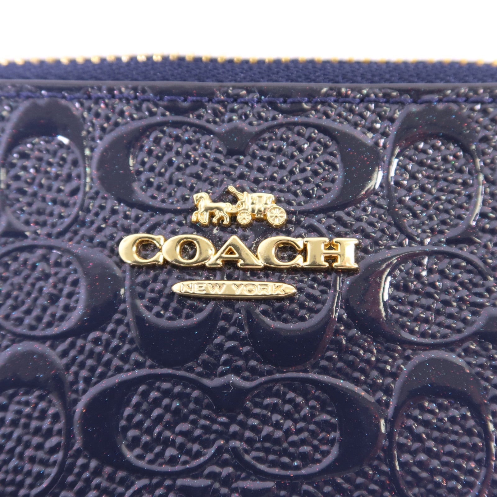 COACH 牛皮皮革Pouch金扣手拿包