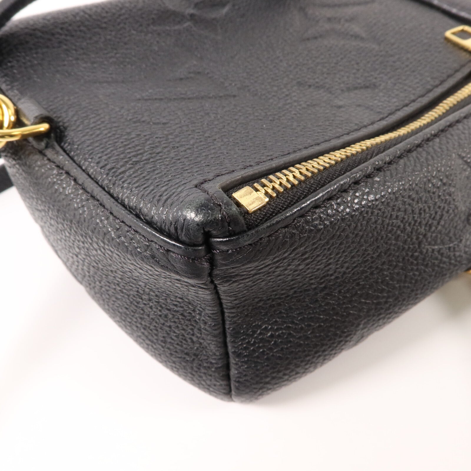LOUIS VUITTON Monogram Empreinte Tiny Backpack金扣背包