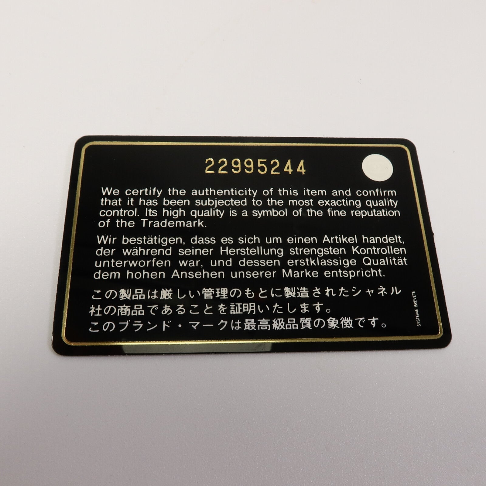 CHANEL 牛皮皮革Zipper Phone Bag鏈帶肩背袋