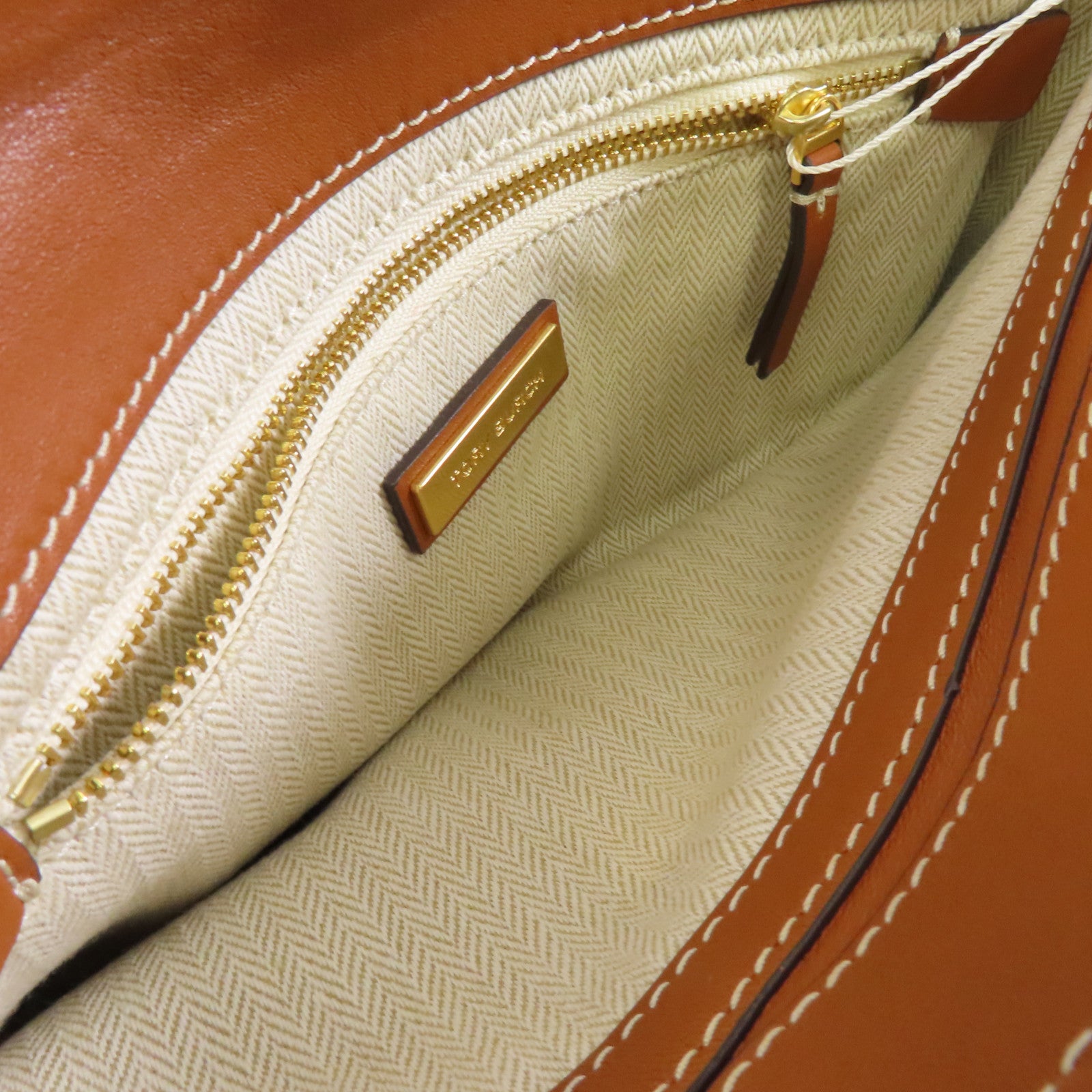 Tory Burch 牛皮皮革Clutch金扣手拿包啡色