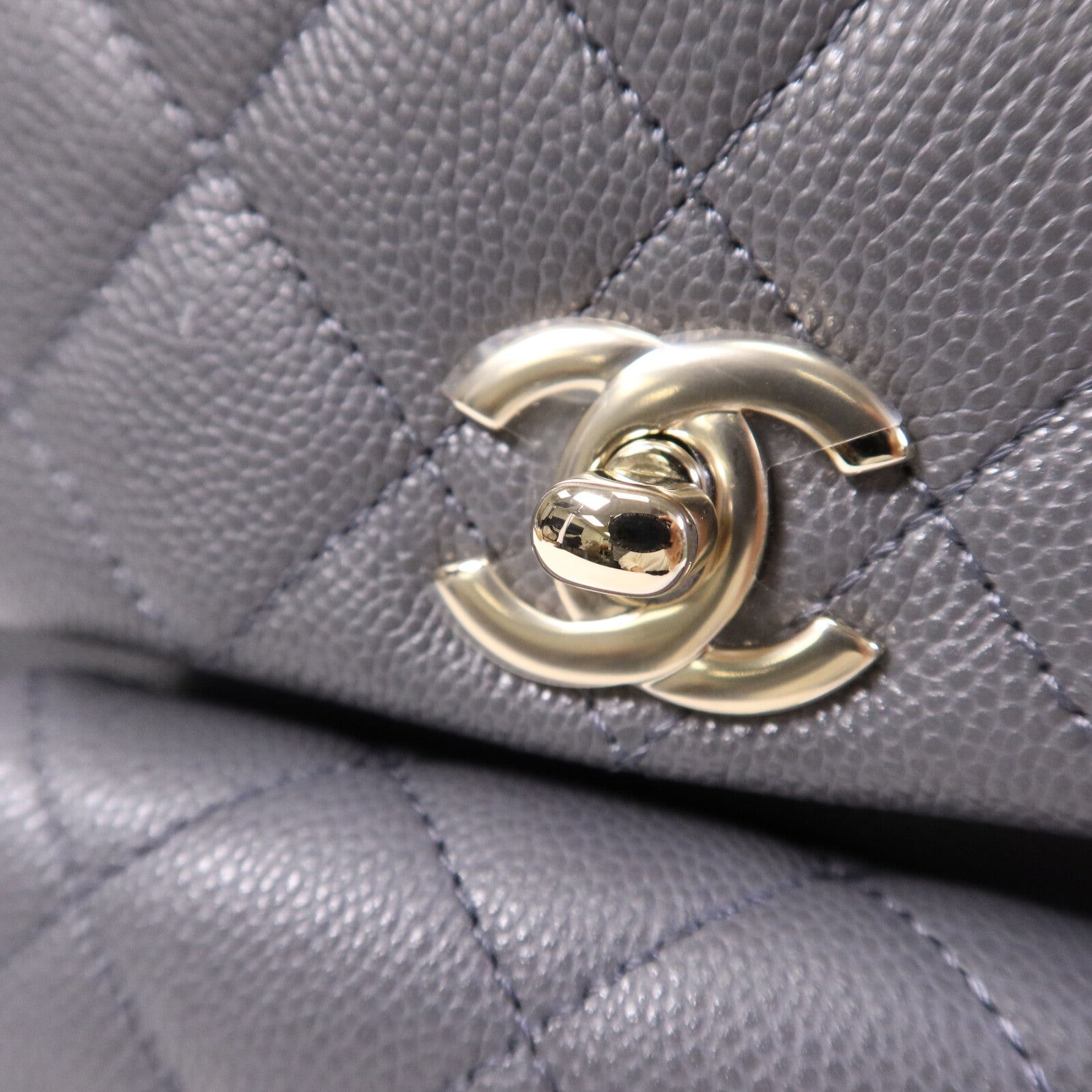 CHANEL 牛皮皮革Duma Backpack金扣背包